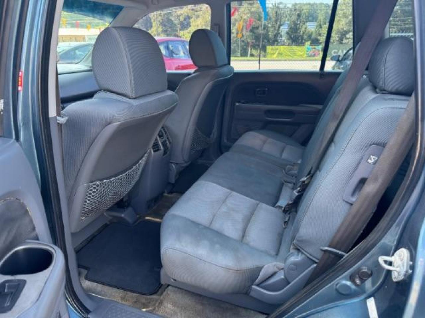 2006 Blue Honda Pilot LX (5FNYF28106B) with an 3.5L V6 SOHC 24V engine, 5-Speed Automatic transmission, located at 1806 Veterans Memorial Hwy SW, Austell, GA, 30168, (770) 944-9558, 33.817959, -84.606987 - Photo#9