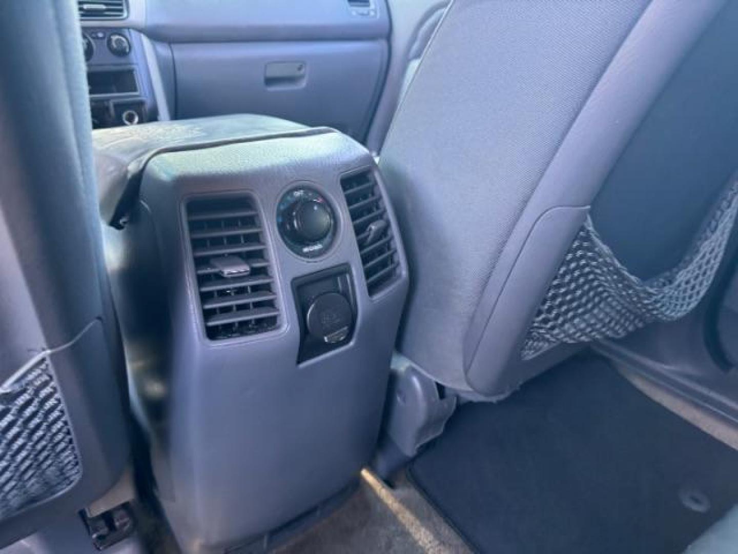 2006 Blue Honda Pilot LX (5FNYF28106B) with an 3.5L V6 SOHC 24V engine, 5-Speed Automatic transmission, located at 1806 Veterans Memorial Hwy SW, Austell, GA, 30168, (770) 944-9558, 33.817959, -84.606987 - Photo#13