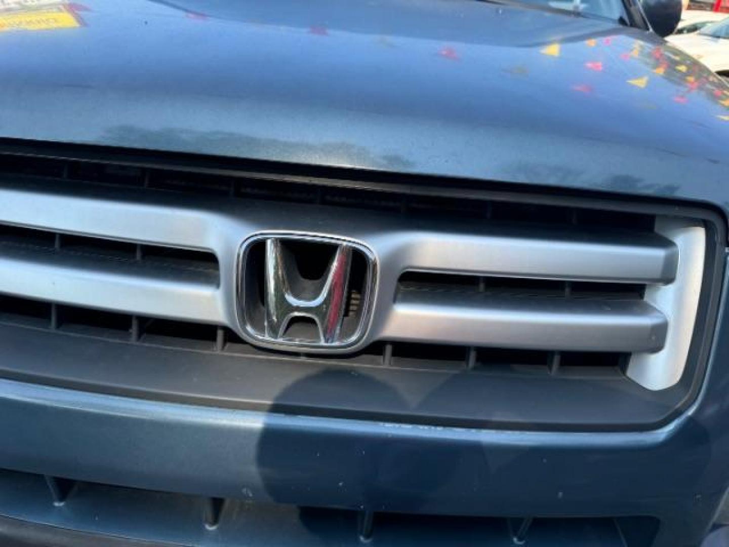 2006 Blue Honda Pilot LX (5FNYF28106B) with an 3.5L V6 SOHC 24V engine, 5-Speed Automatic transmission, located at 1806 Veterans Memorial Hwy SW, Austell, GA, 30168, (770) 944-9558, 33.817959, -84.606987 - Photo#19