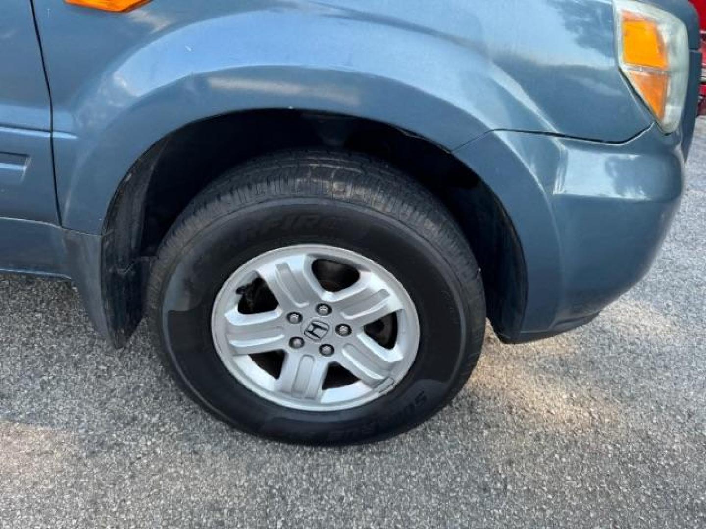 2006 Blue Honda Pilot LX (5FNYF28106B) with an 3.5L V6 SOHC 24V engine, 5-Speed Automatic transmission, located at 1806 Veterans Memorial Hwy SW, Austell, GA, 30168, (770) 944-9558, 33.817959, -84.606987 - Photo#21