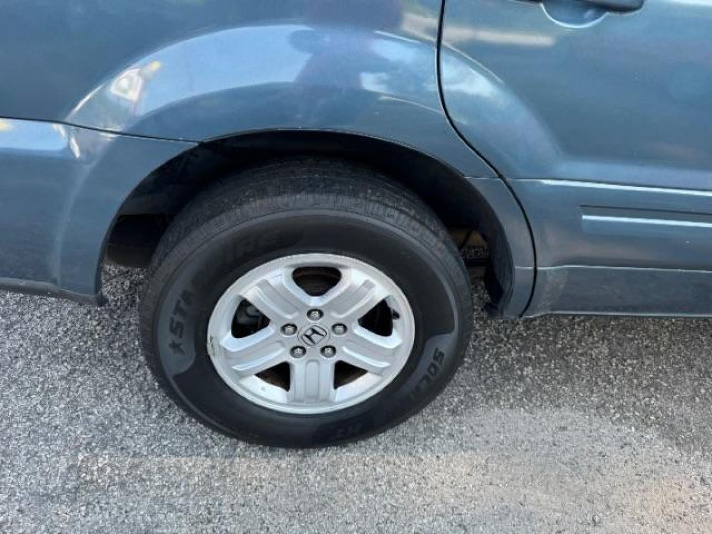 2006 Blue Honda Pilot LX (5FNYF28106B) with an 3.5L V6 SOHC 24V engine, 5-Speed Automatic transmission, located at 1806 Veterans Memorial Hwy SW, Austell, GA, 30168, (770) 944-9558, 33.817959, -84.606987 - Photo#22