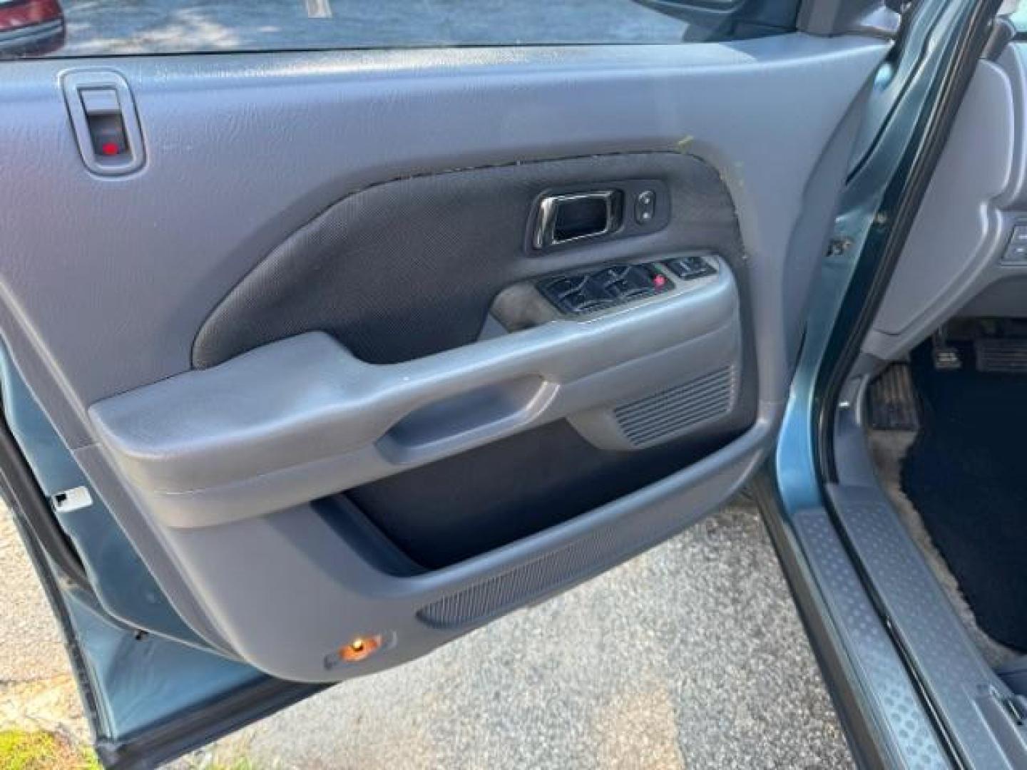 2006 Blue Honda Pilot LX (5FNYF28106B) with an 3.5L V6 SOHC 24V engine, 5-Speed Automatic transmission, located at 1806 Veterans Memorial Hwy SW, Austell, GA, 30168, (770) 944-9558, 33.817959, -84.606987 - Photo#6