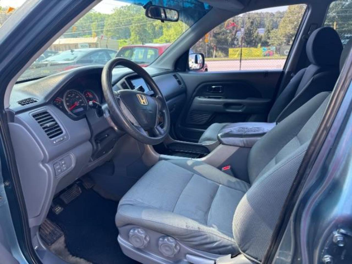 2006 Blue Honda Pilot LX (5FNYF28106B) with an 3.5L V6 SOHC 24V engine, 5-Speed Automatic transmission, located at 1806 Veterans Memorial Hwy SW, Austell, GA, 30168, (770) 944-9558, 33.817959, -84.606987 - Photo#7