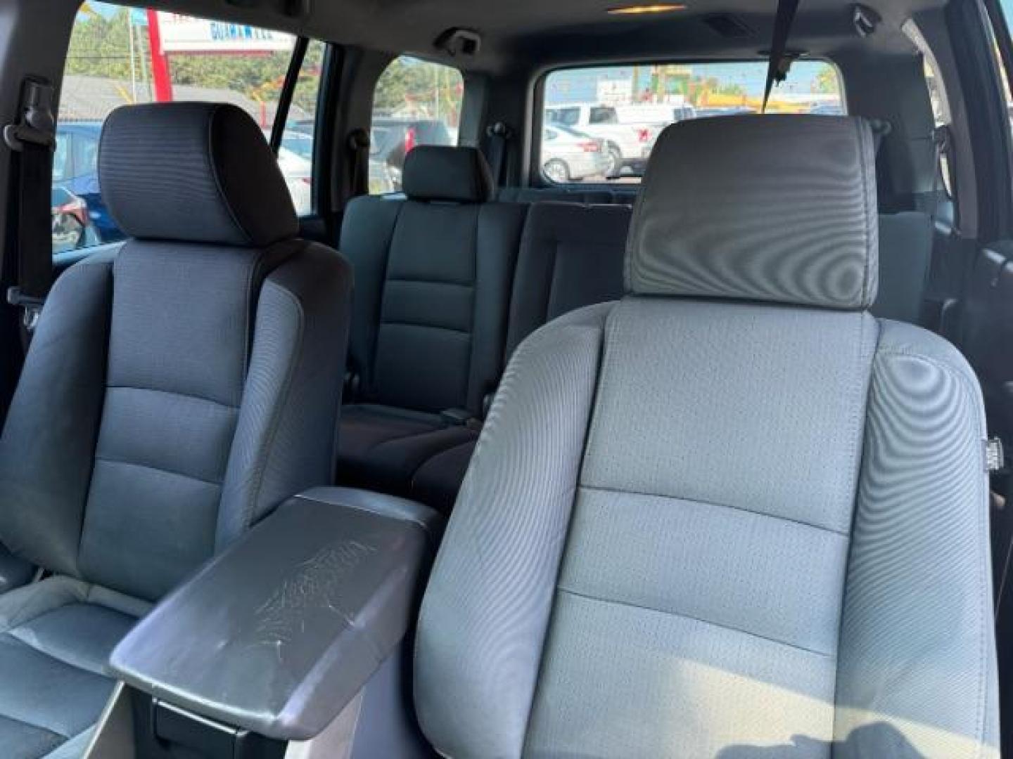 2006 Blue Honda Pilot LX (5FNYF28106B) with an 3.5L V6 SOHC 24V engine, 5-Speed Automatic transmission, located at 1806 Veterans Memorial Hwy SW, Austell, GA, 30168, (770) 944-9558, 33.817959, -84.606987 - Photo#8