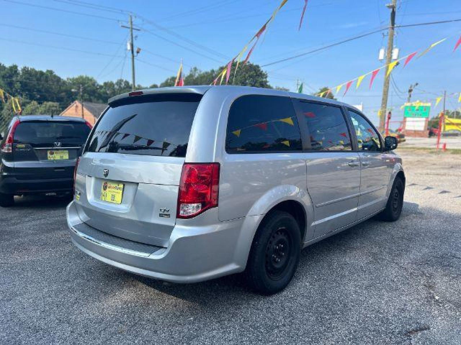 2011 Silver Dodge Grand Caravan Express (2D4RN4DG8BR) with an 3.6L V6 DOHC 24V engine, located at 1806 Veterans Memorial Hwy SW, Austell, GA, 30168, (770) 944-9558, 33.817959, -84.606987 - Photo #3