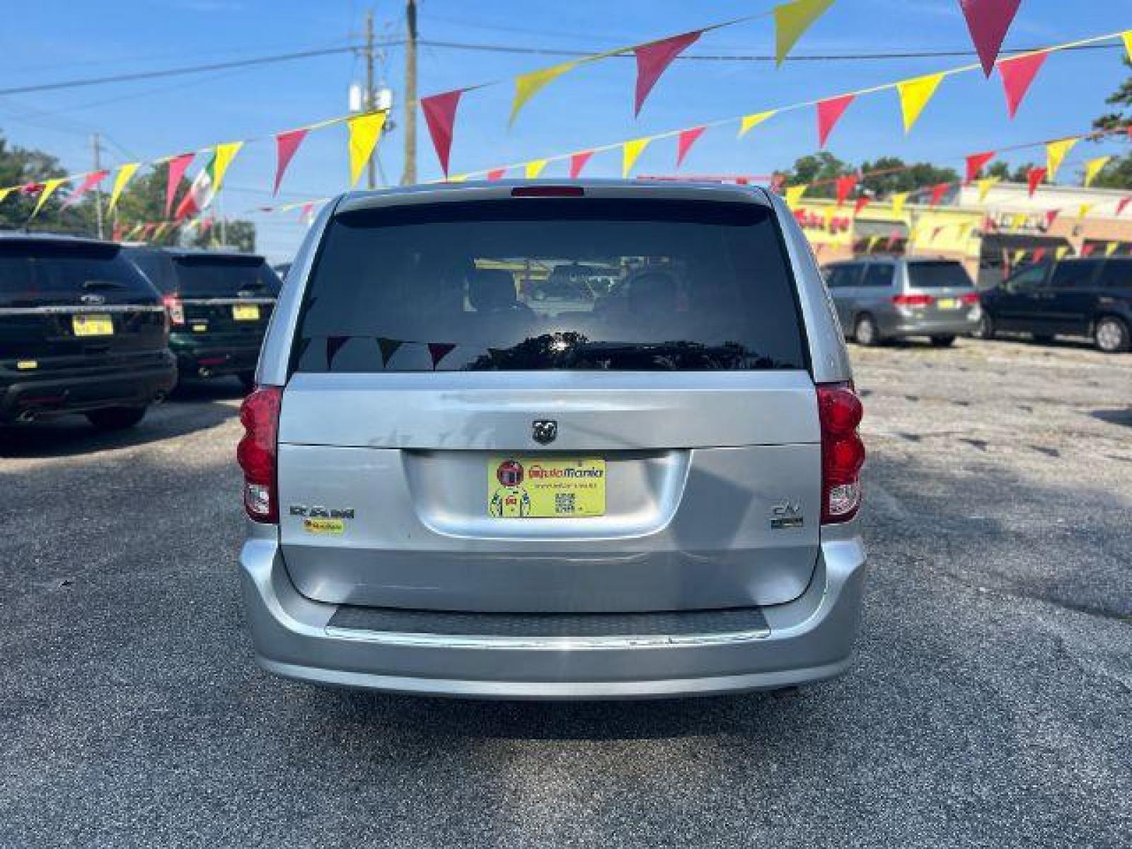 2011 Silver Dodge Grand Caravan Express (2D4RN4DG8BR) with an 3.6L V6 DOHC 24V engine, located at 1806 Veterans Memorial Hwy SW, Austell, GA, 30168, (770) 944-9558, 33.817959, -84.606987 - Photo #4