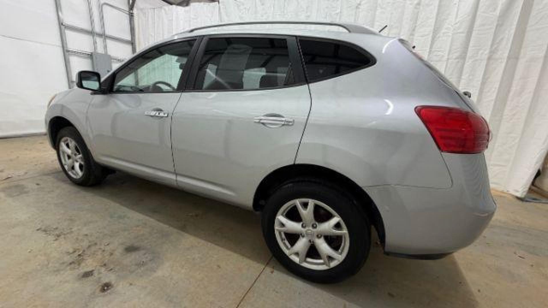2010 Silver Nissan Rogue S AWD (JN8AS5MV4AW) with an 2.5L L4 DOHC 16V engine, Continuously Variabl transmission, located at 1806 Veterans Memorial Hwy SW, Austell, GA, 30168, (770) 944-9558, 33.817959, -84.606987 - Photo#2
