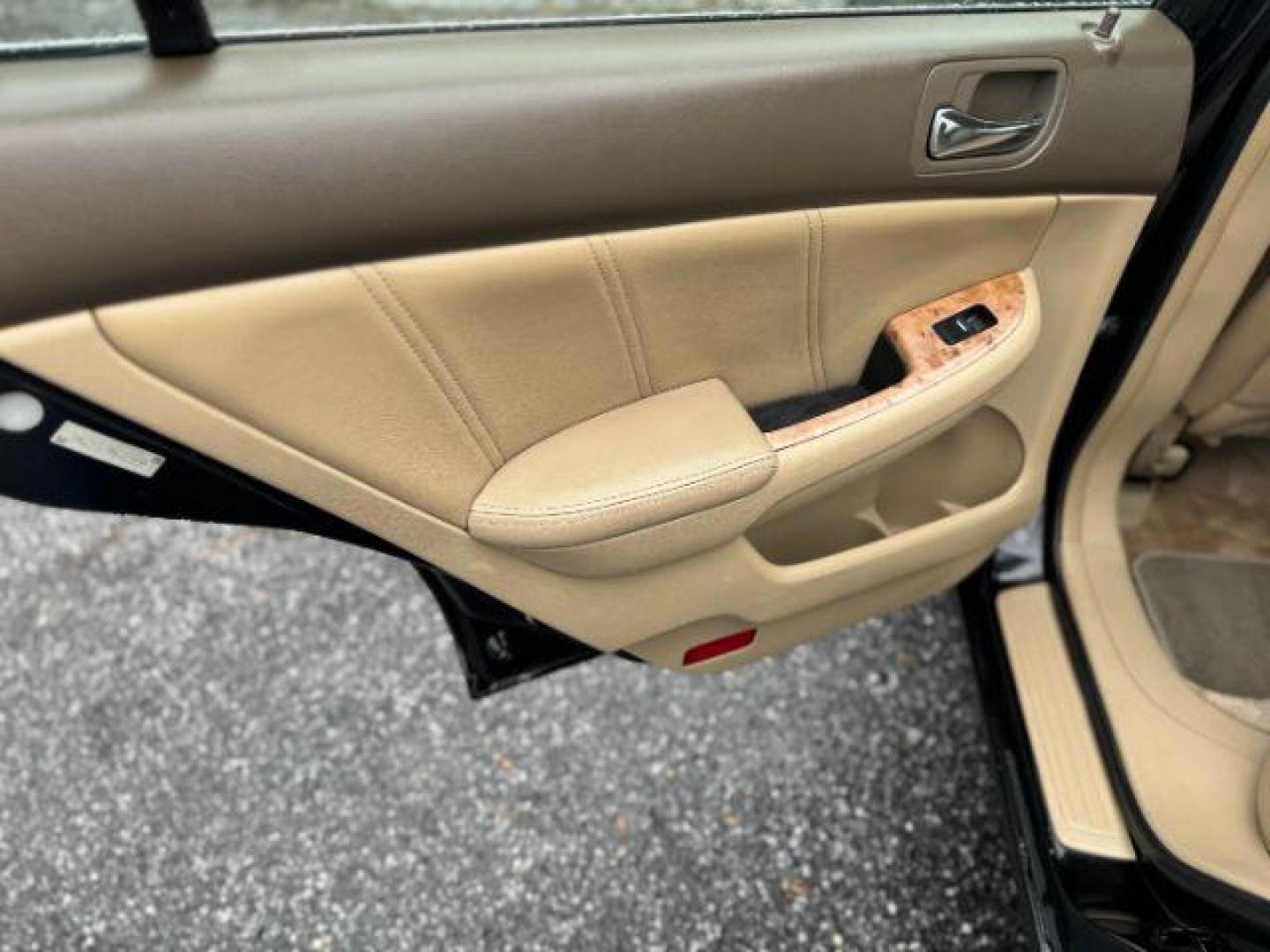 2005 Black Honda Accord EX-L Sedan AT with XM Radio (1HGCM56895A) with an 2.4L L4 DOHC 16V engine, 5-Speed Automatic transmission, located at 1806 Veterans Memorial Hwy SW, Austell, GA, 30168, (770) 944-9558, 33.817959, -84.606987 - Photo#10