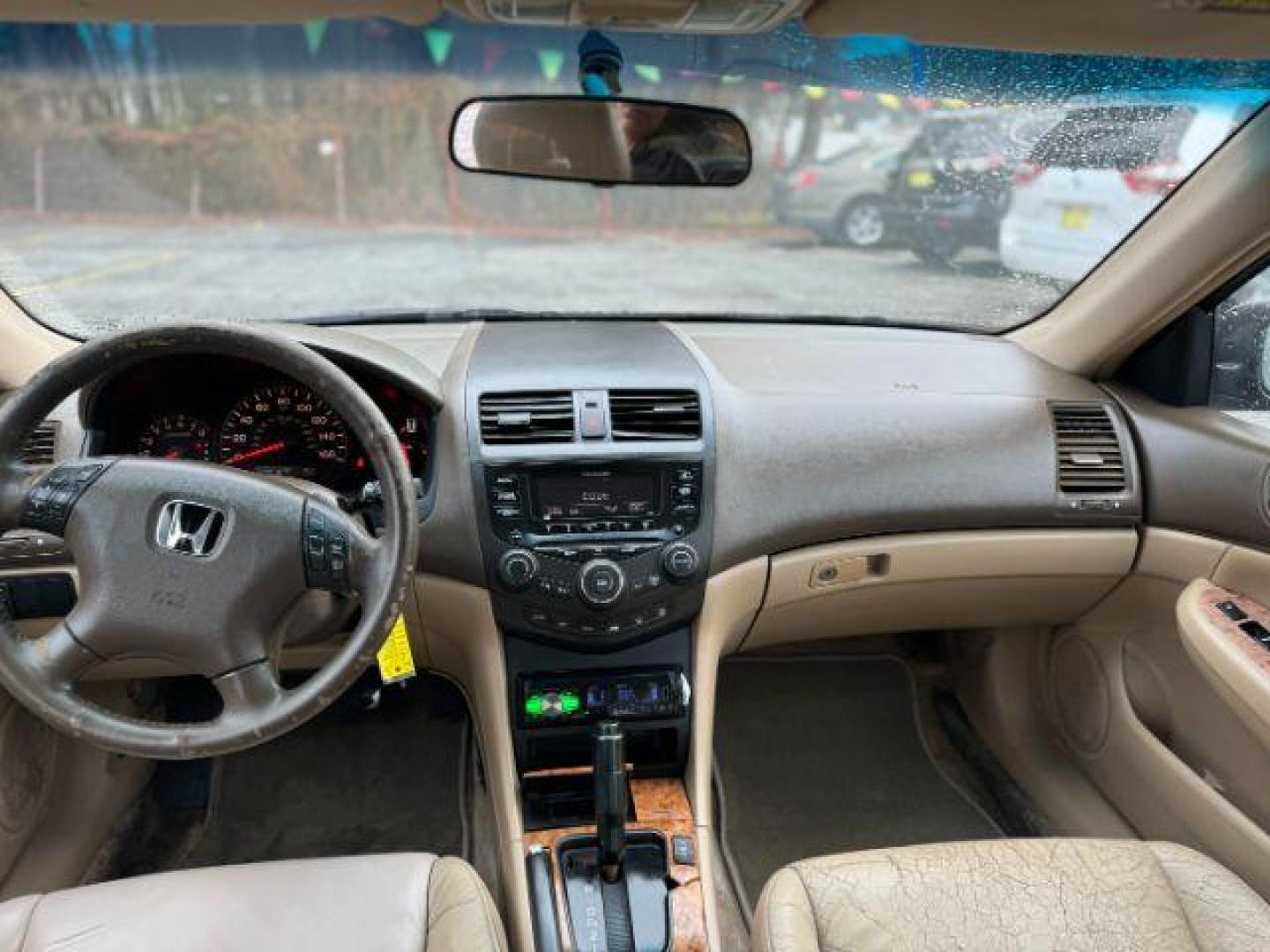 2005 Black Honda Accord EX-L Sedan AT with XM Radio (1HGCM56895A) with an 2.4L L4 DOHC 16V engine, 5-Speed Automatic transmission, located at 1806 Veterans Memorial Hwy SW, Austell, GA, 30168, (770) 944-9558, 33.817959, -84.606987 - Photo#11
