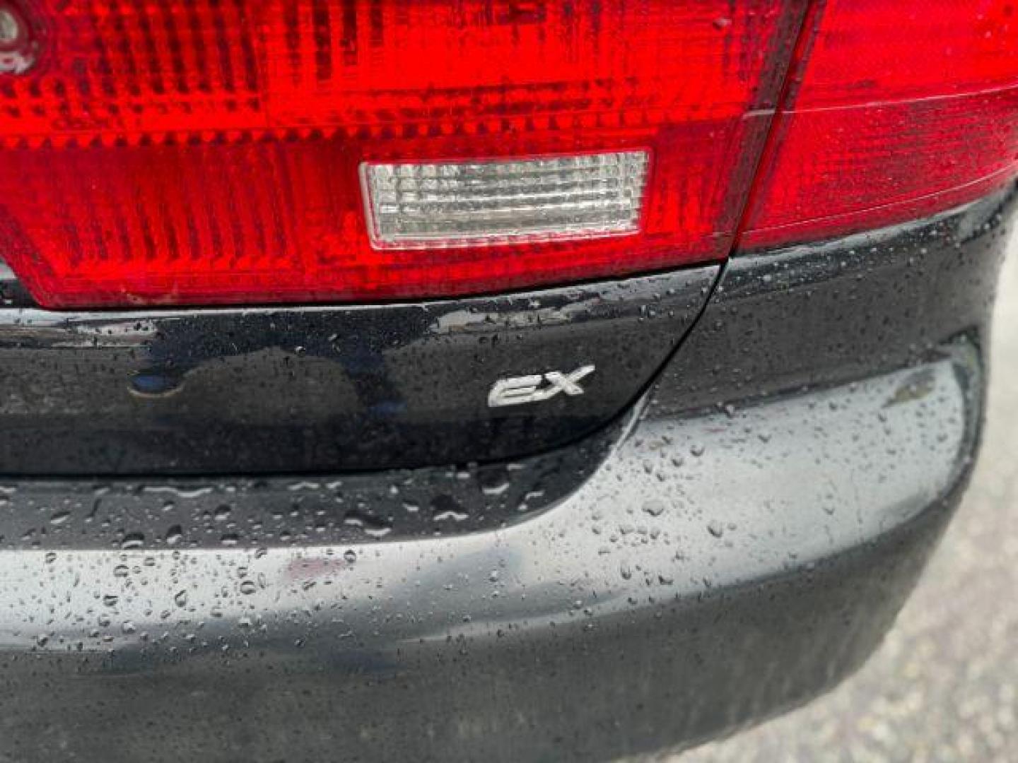 2005 Black Honda Accord EX-L Sedan AT with XM Radio (1HGCM56895A) with an 2.4L L4 DOHC 16V engine, 5-Speed Automatic transmission, located at 1806 Veterans Memorial Hwy SW, Austell, GA, 30168, (770) 944-9558, 33.817959, -84.606987 - Photo#14