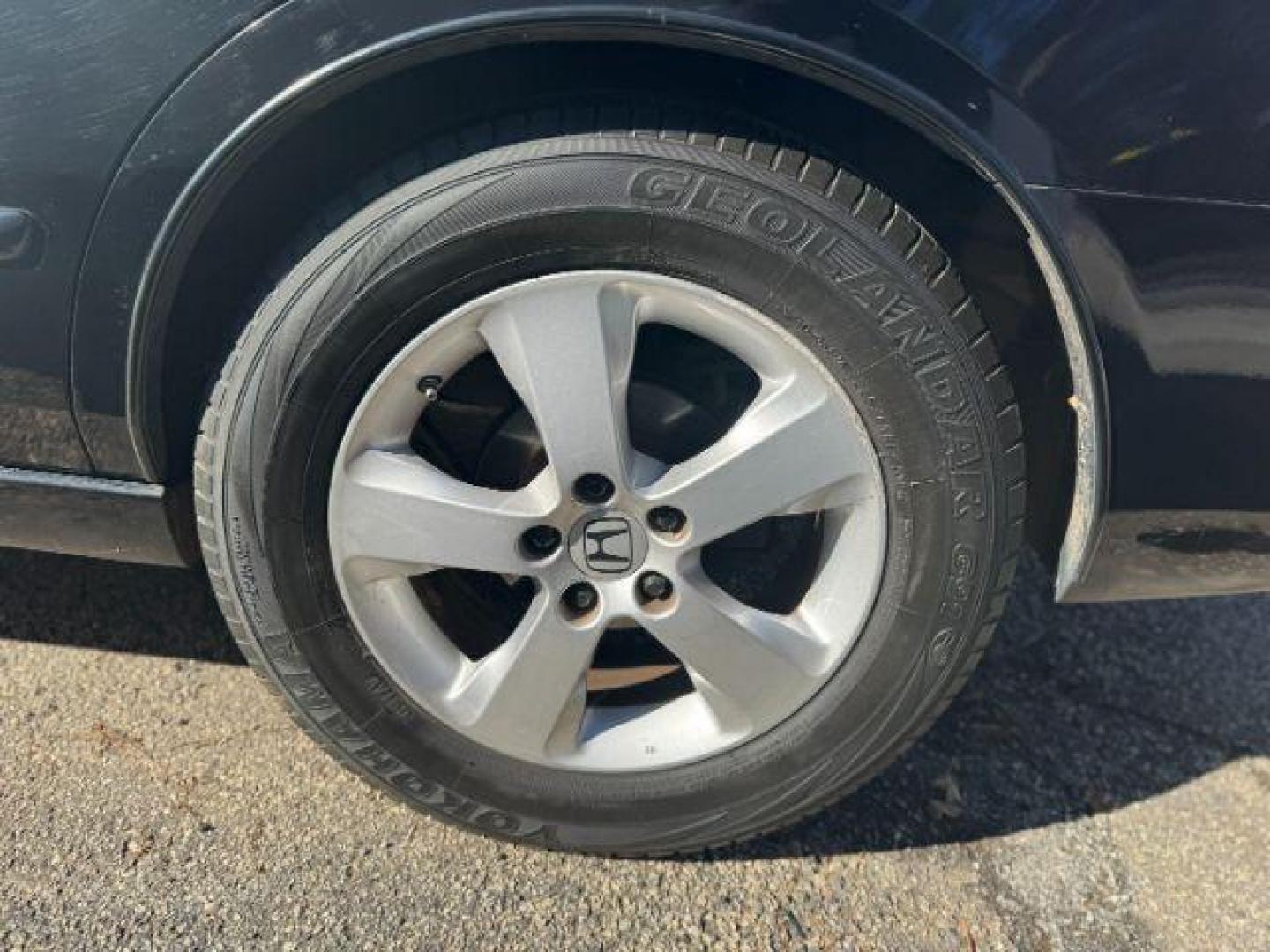 2005 Black Honda Accord EX-L Sedan AT with XM Radio (1HGCM56895A) with an 2.4L L4 DOHC 16V engine, 5-Speed Automatic transmission, located at 1806 Veterans Memorial Hwy SW, Austell, GA, 30168, (770) 944-9558, 33.817959, -84.606987 - Photo#16