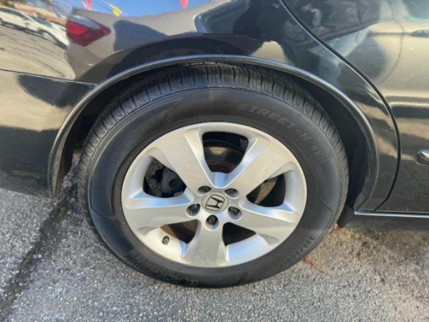 2005 Black Honda Accord EX-L Sedan AT with XM Radio (1HGCM56895A) with an 2.4L L4 DOHC 16V engine, 5-Speed Automatic transmission, located at 1806 Veterans Memorial Hwy SW, Austell, GA, 30168, (770) 944-9558, 33.817959, -84.606987 - Photo#19