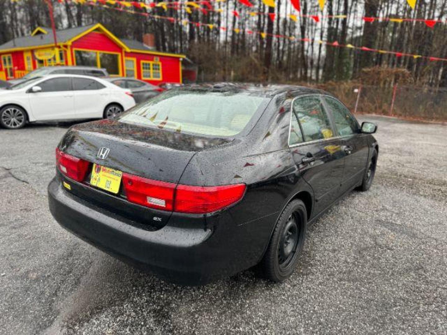 2005 Black Honda Accord EX-L Sedan AT with XM Radio (1HGCM56895A) with an 2.4L L4 DOHC 16V engine, 5-Speed Automatic transmission, located at 1806 Veterans Memorial Hwy SW, Austell, GA, 30168, (770) 944-9558, 33.817959, -84.606987 - Photo#3