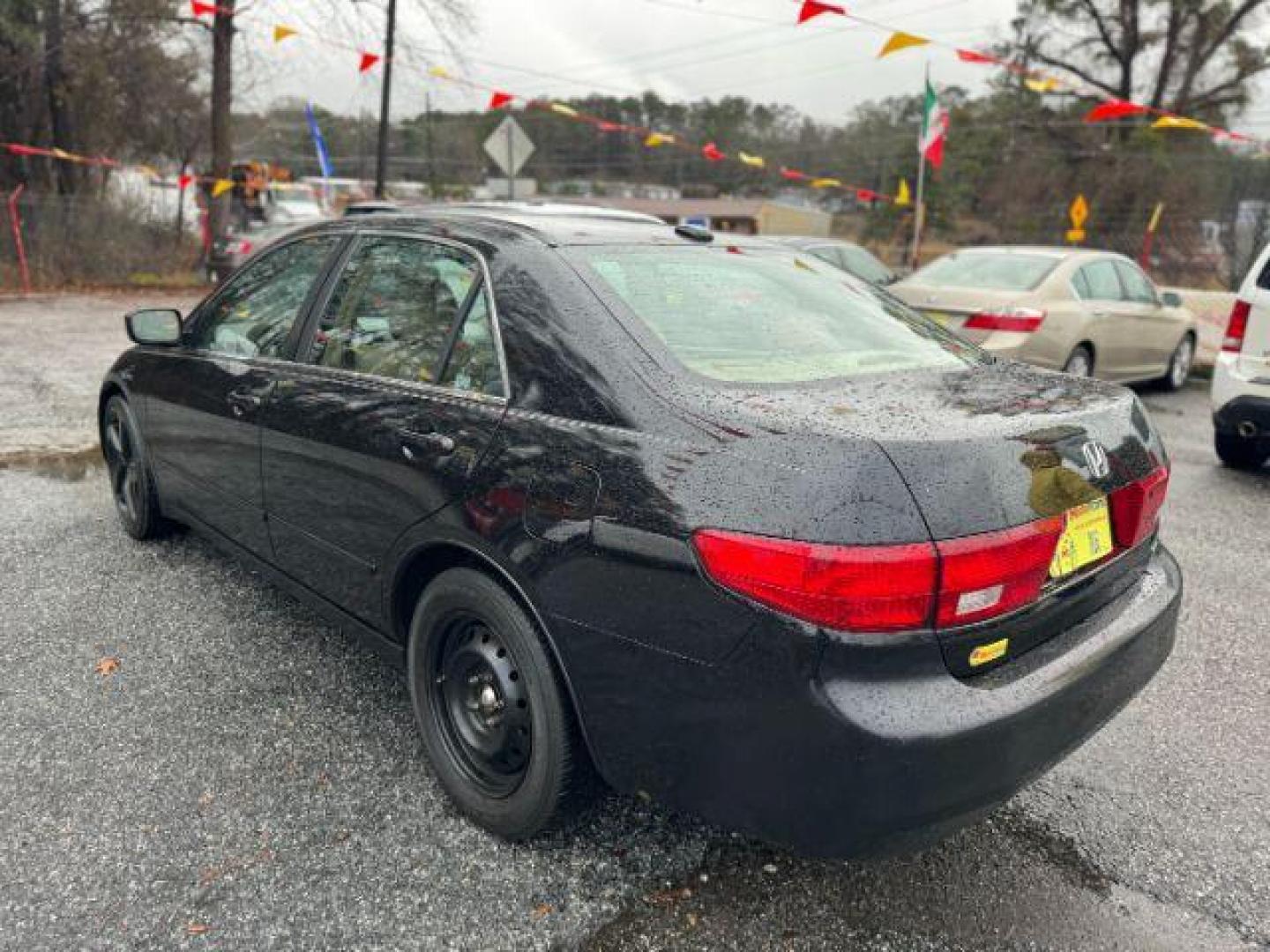 2005 Black Honda Accord EX-L Sedan AT with XM Radio (1HGCM56895A) with an 2.4L L4 DOHC 16V engine, 5-Speed Automatic transmission, located at 1806 Veterans Memorial Hwy SW, Austell, GA, 30168, (770) 944-9558, 33.817959, -84.606987 - Photo#5