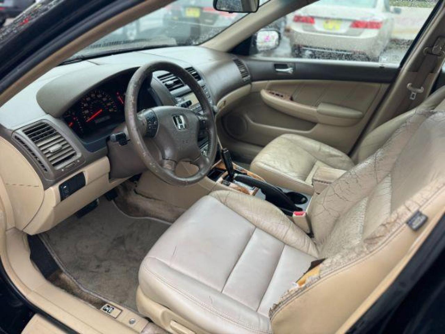 2005 Black Honda Accord EX-L Sedan AT with XM Radio (1HGCM56895A) with an 2.4L L4 DOHC 16V engine, 5-Speed Automatic transmission, located at 1806 Veterans Memorial Hwy SW, Austell, GA, 30168, (770) 944-9558, 33.817959, -84.606987 - Photo#6