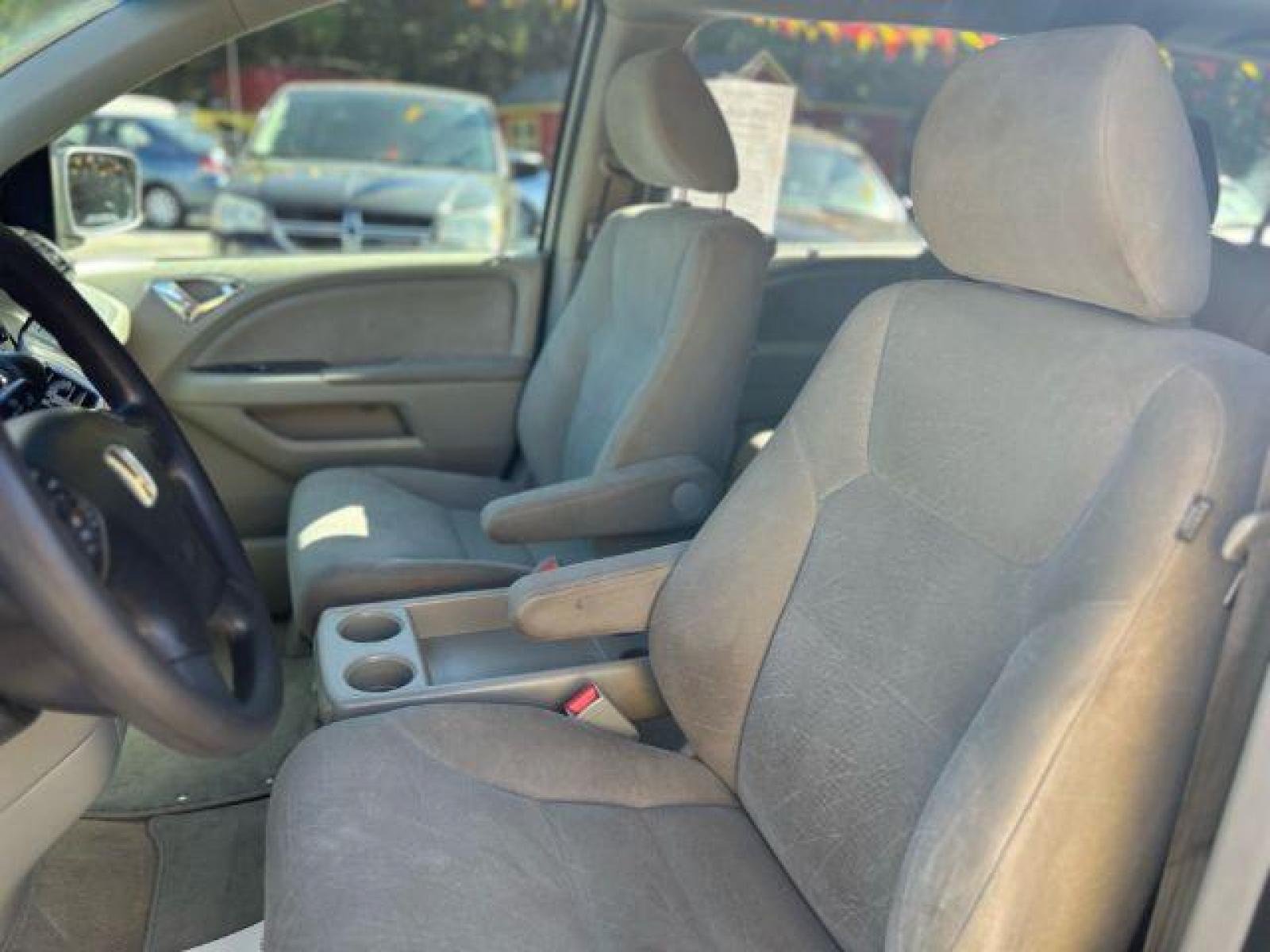 2010 Silver Honda Odyssey EX (5FNRL3H48AB) with an 3.5L V6 SOHC 24V engine, 5-Speed Automatic transmission, located at 1806 Veterans Memorial Hwy SW, Austell, GA, 30168, (770) 944-9558, 33.817959, -84.606987 - Photo #9
