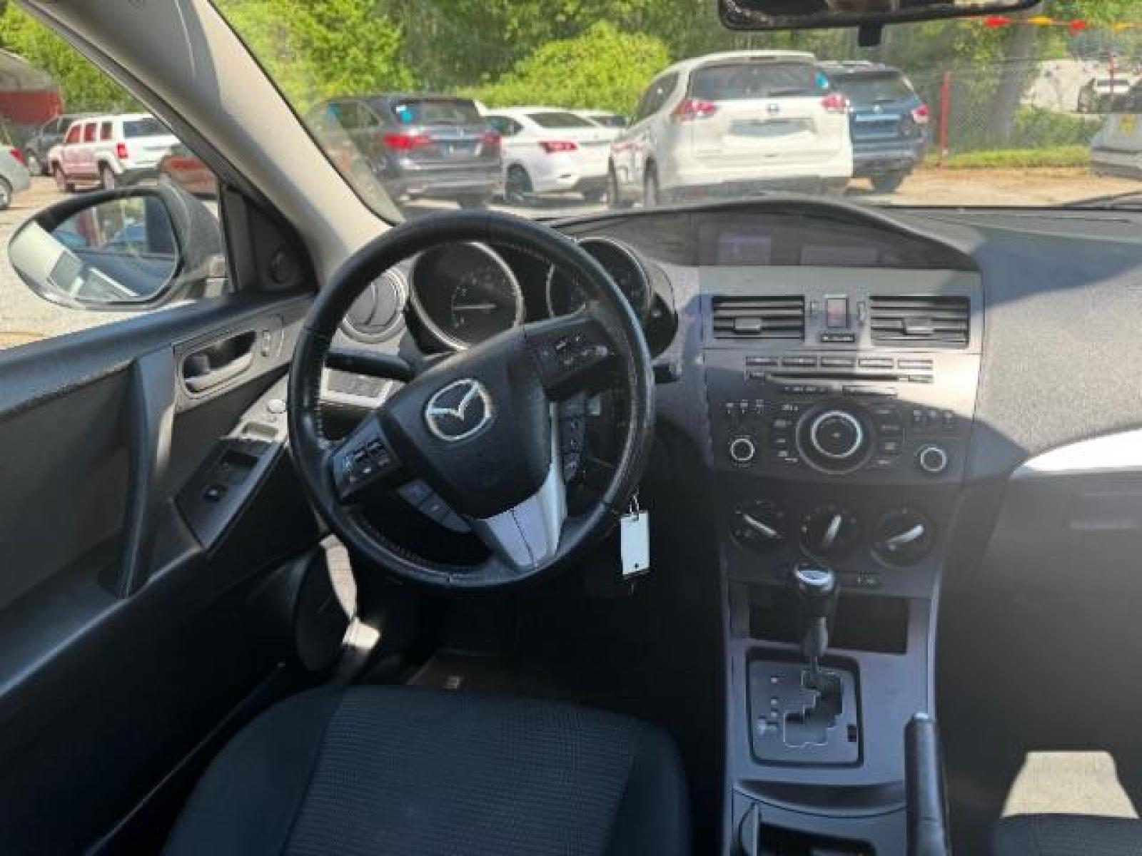2012 GRAY Mazda MAZDA3 I Touring 5-Door (JM1BL1L83C1) with an 2.0L L4 DOHC 16V engine, 5-Speed Automatic transmission, located at 1806 Veterans Memorial Hwy SW, Austell, GA, 30168, (770) 944-9558, 33.817959, -84.606987 - Photo #12