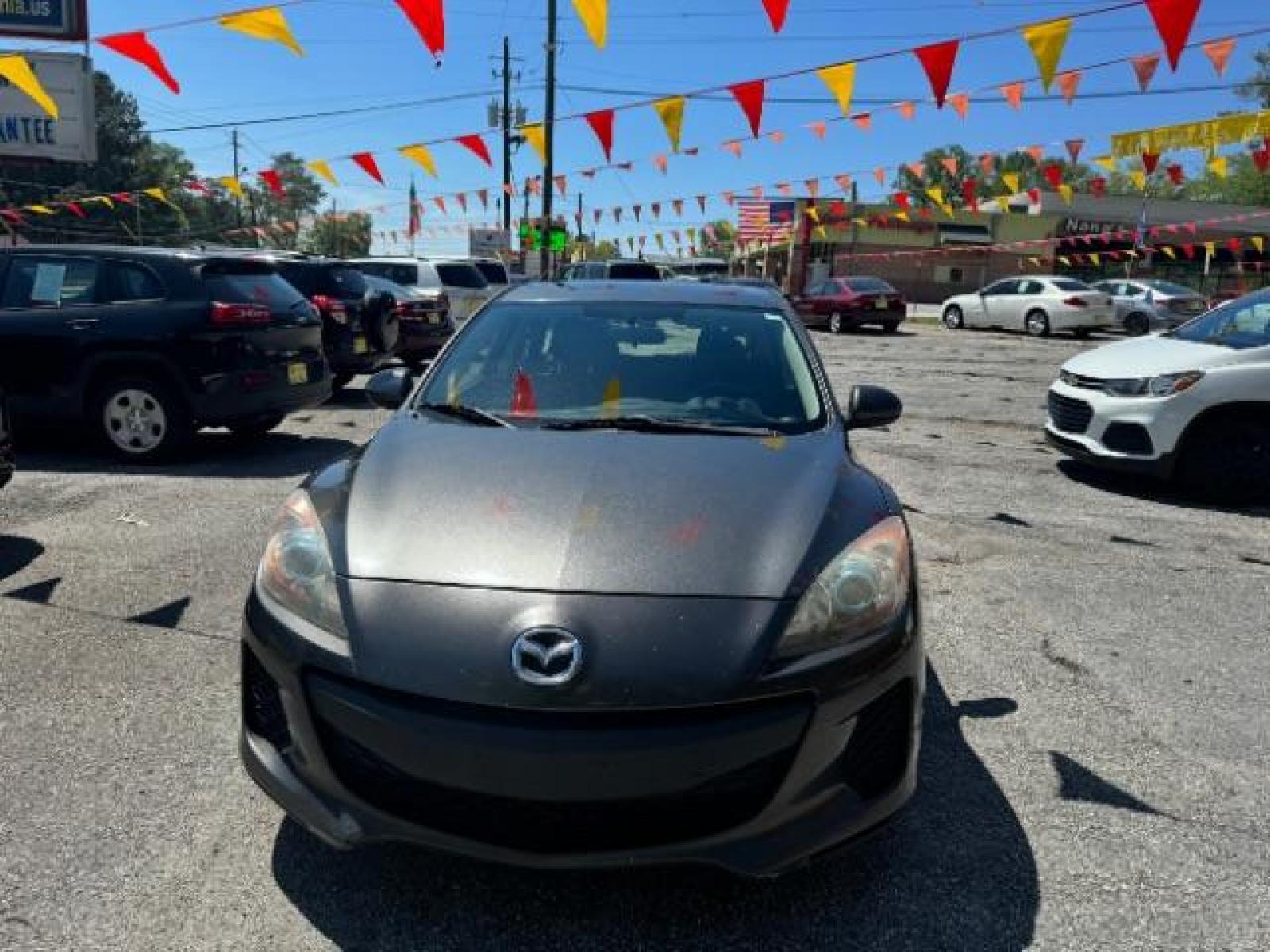 2012 GRAY Mazda MAZDA3 I Touring 5-Door (JM1BL1L83C1) with an 2.0L L4 DOHC 16V engine, 5-Speed Automatic transmission, located at 1806 Veterans Memorial Hwy SW, Austell, GA, 30168, (770) 944-9558, 33.817959, -84.606987 - Photo #1
