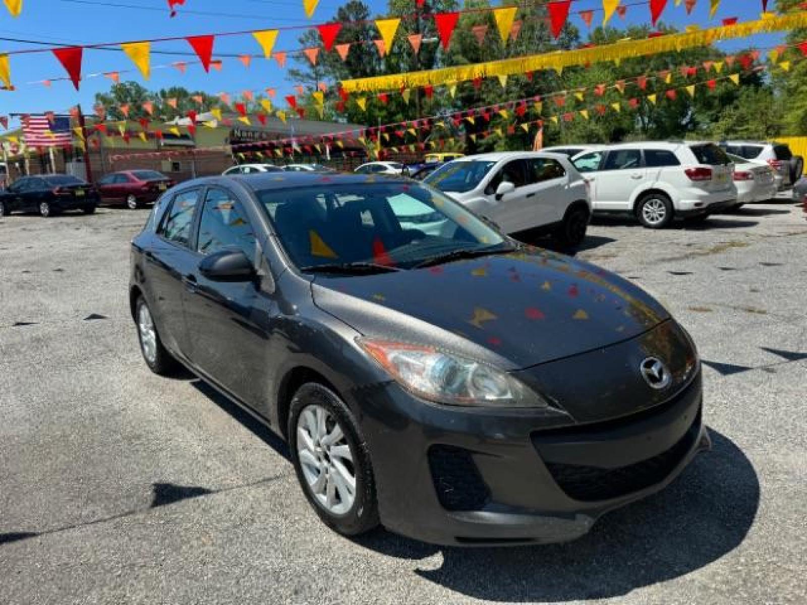 2012 GRAY Mazda MAZDA3 I Touring 5-Door (JM1BL1L83C1) with an 2.0L L4 DOHC 16V engine, 5-Speed Automatic transmission, located at 1806 Veterans Memorial Hwy SW, Austell, GA, 30168, (770) 944-9558, 33.817959, -84.606987 - Photo #2