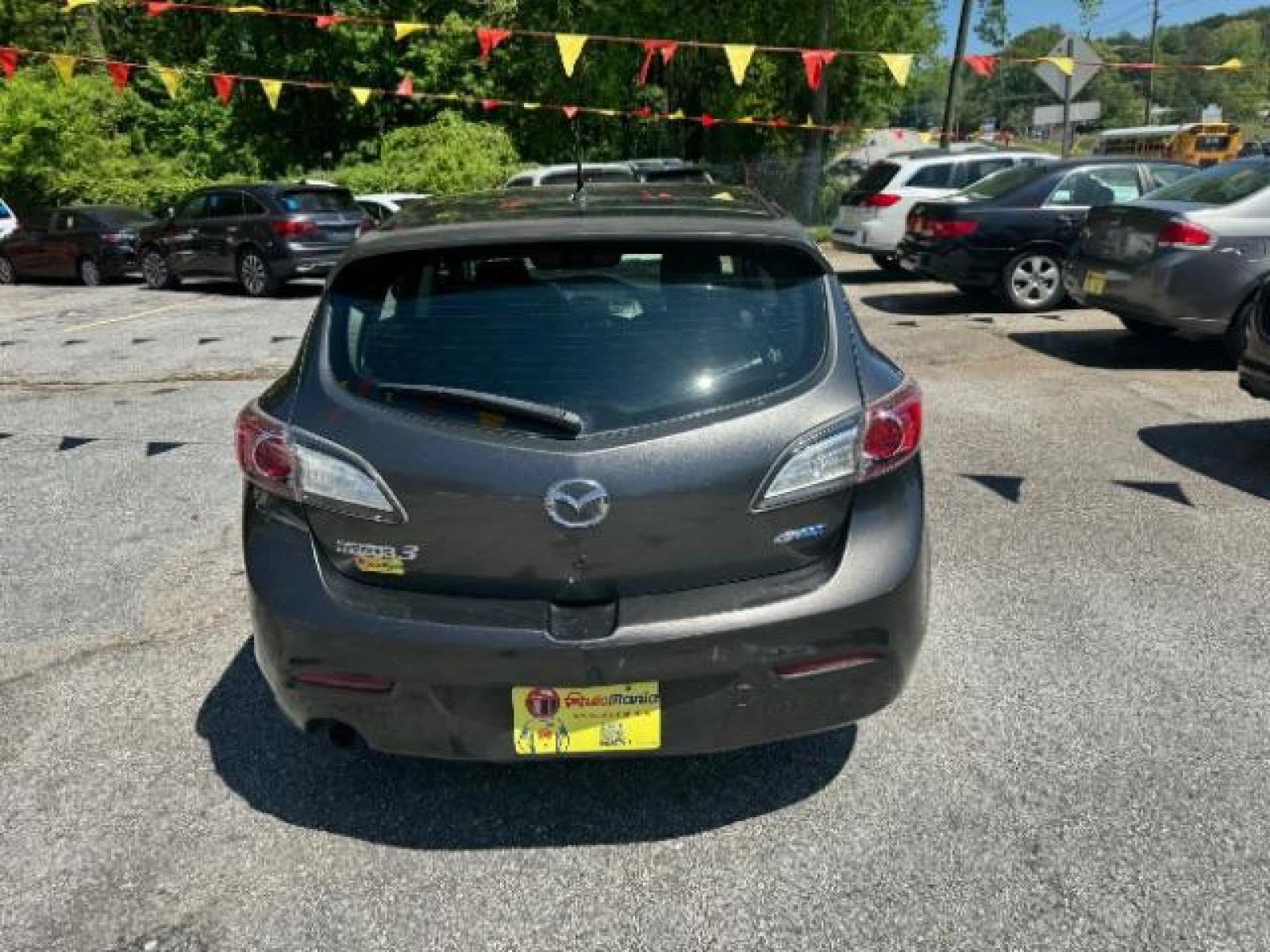 2012 GRAY Mazda MAZDA3 I Touring 5-Door (JM1BL1L83C1) with an 2.0L L4 DOHC 16V engine, 5-Speed Automatic transmission, located at 1806 Veterans Memorial Hwy SW, Austell, GA, 30168, (770) 944-9558, 33.817959, -84.606987 - Photo #4