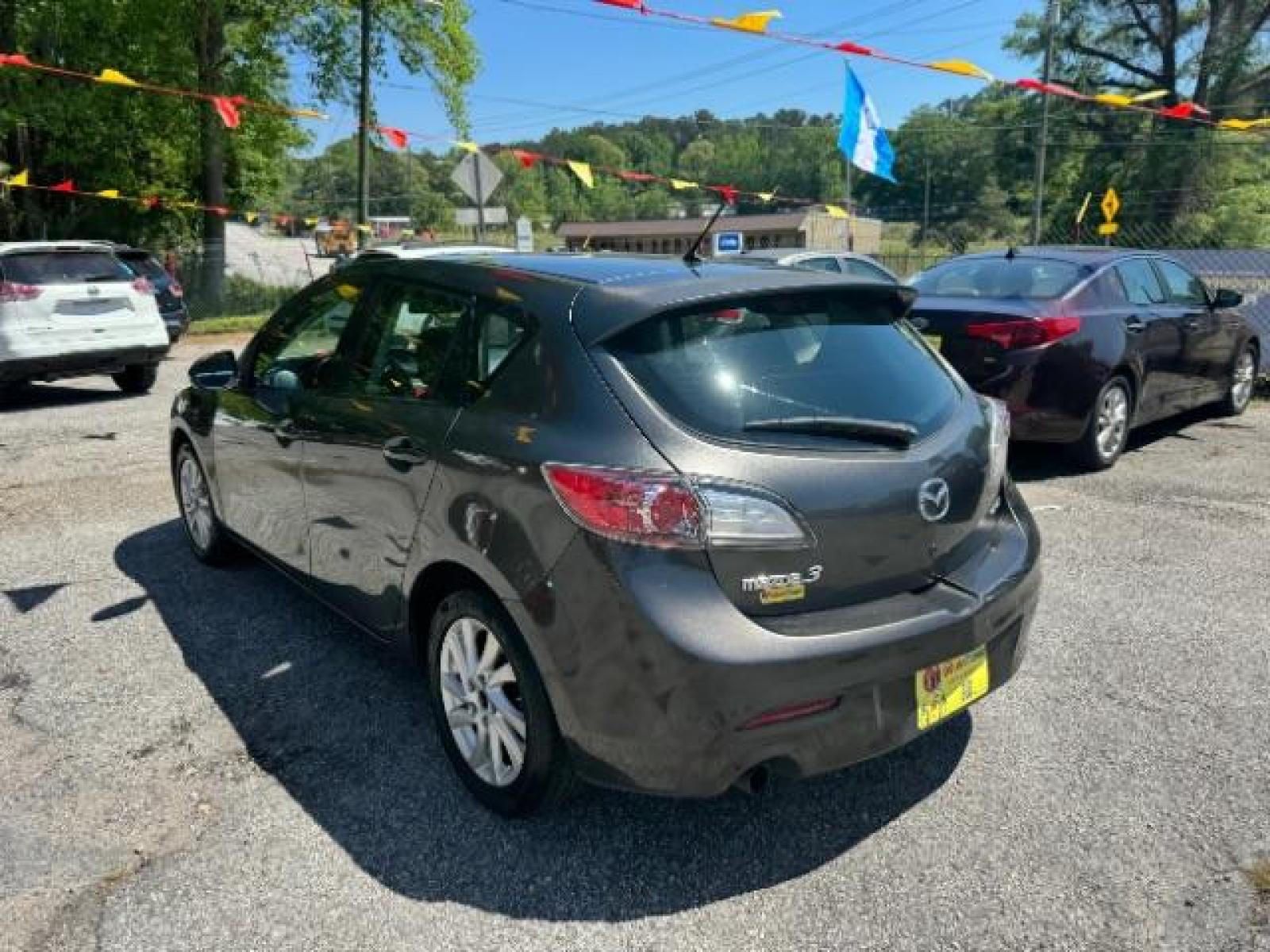 2012 GRAY Mazda MAZDA3 I Touring 5-Door (JM1BL1L83C1) with an 2.0L L4 DOHC 16V engine, 5-Speed Automatic transmission, located at 1806 Veterans Memorial Hwy SW, Austell, GA, 30168, (770) 944-9558, 33.817959, -84.606987 - Photo #5