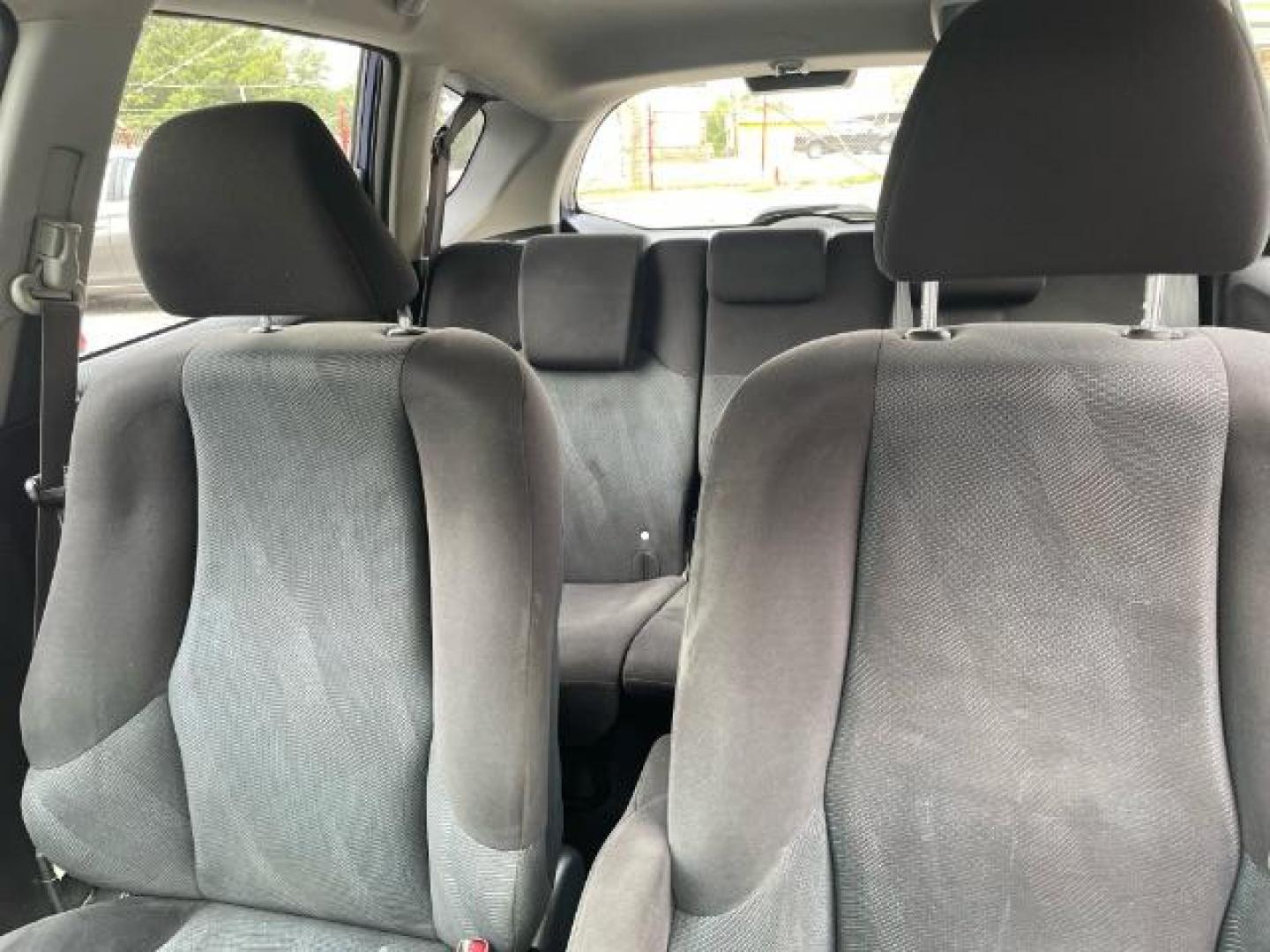 2011 Blue Honda Fit Sport 5-Speed AT (JHMGE8H5XBC) with an 1.5L L4 SOHC 16V engine, 5-Speed Automatic transmission, located at 1806 Veterans Memorial Hwy SW, Austell, GA, 30168, (770) 944-9558, 33.817959, -84.606987 - Photo#9