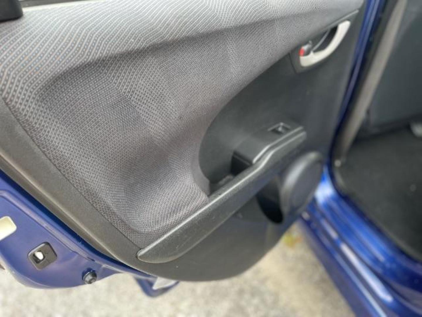 2011 Blue Honda Fit Sport 5-Speed AT (JHMGE8H5XBC) with an 1.5L L4 SOHC 16V engine, 5-Speed Automatic transmission, located at 1806 Veterans Memorial Hwy SW, Austell, GA, 30168, (770) 944-9558, 33.817959, -84.606987 - Photo#11