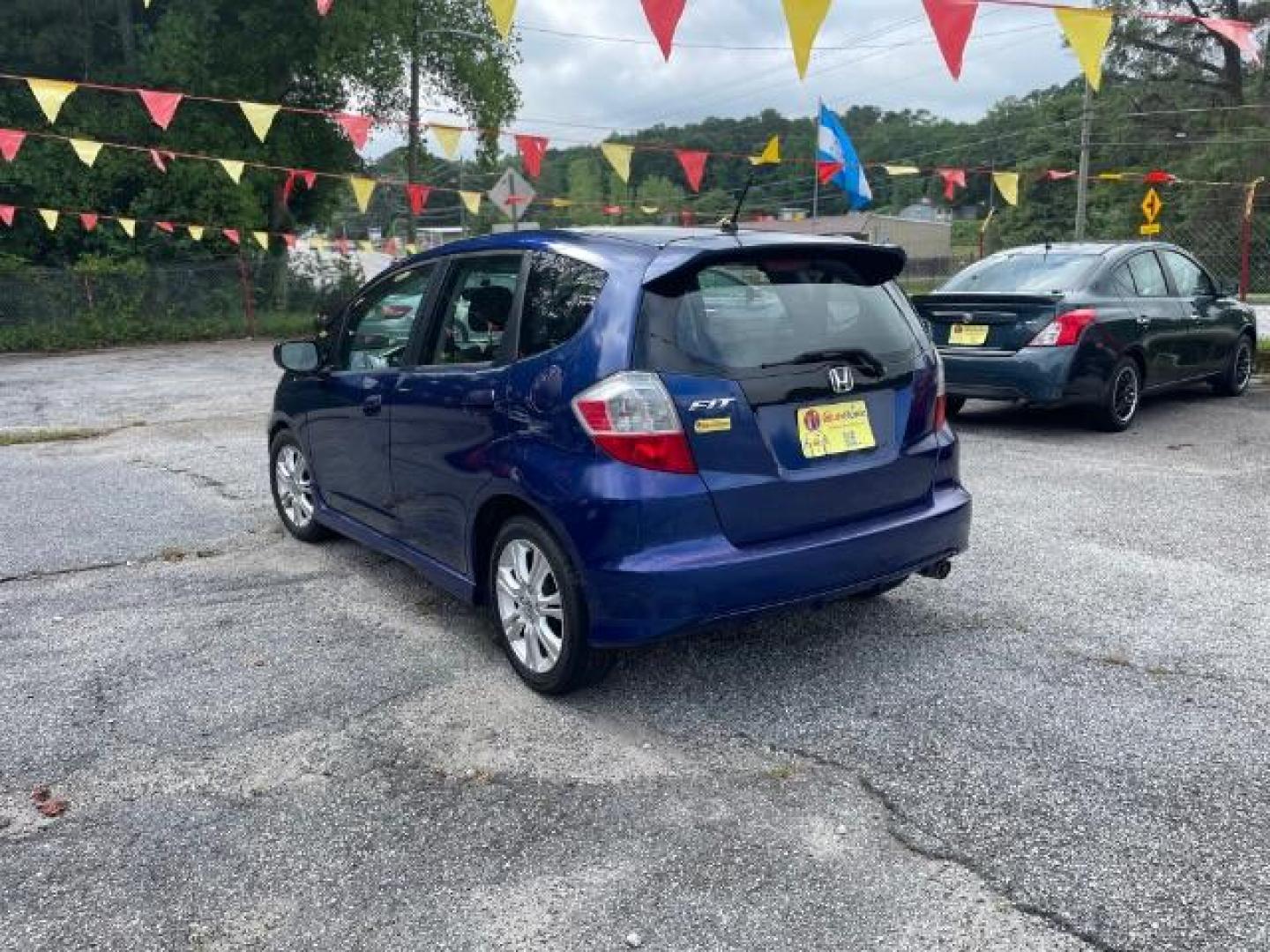 2011 Blue Honda Fit Sport 5-Speed AT (JHMGE8H5XBC) with an 1.5L L4 SOHC 16V engine, 5-Speed Automatic transmission, located at 1806 Veterans Memorial Hwy SW, Austell, GA, 30168, (770) 944-9558, 33.817959, -84.606987 - Photo#3