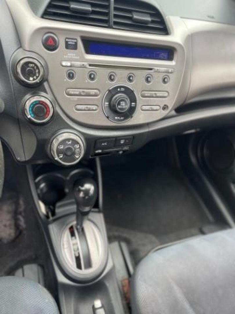 2011 Blue Honda Fit Sport 5-Speed AT (JHMGE8H5XBC) with an 1.5L L4 SOHC 16V engine, 5-Speed Automatic transmission, located at 1806 Veterans Memorial Hwy SW, Austell, GA, 30168, (770) 944-9558, 33.817959, -84.606987 - Photo#7
