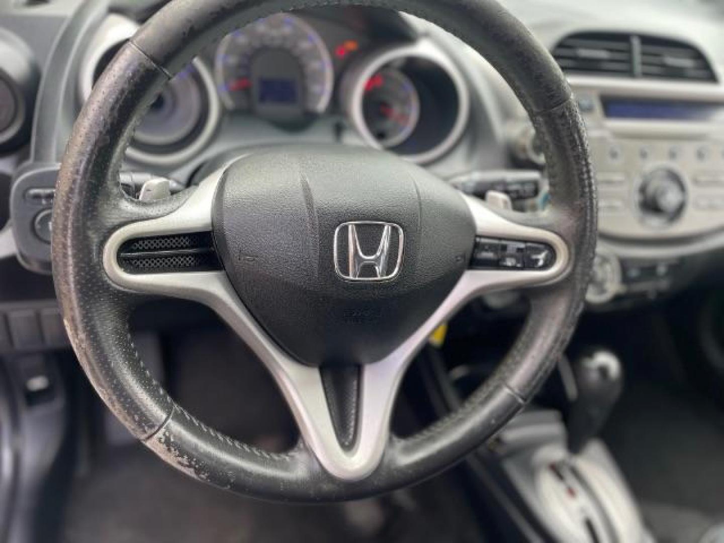 2011 Blue Honda Fit Sport 5-Speed AT (JHMGE8H5XBC) with an 1.5L L4 SOHC 16V engine, 5-Speed Automatic transmission, located at 1806 Veterans Memorial Hwy SW, Austell, GA, 30168, (770) 944-9558, 33.817959, -84.606987 - Photo#8