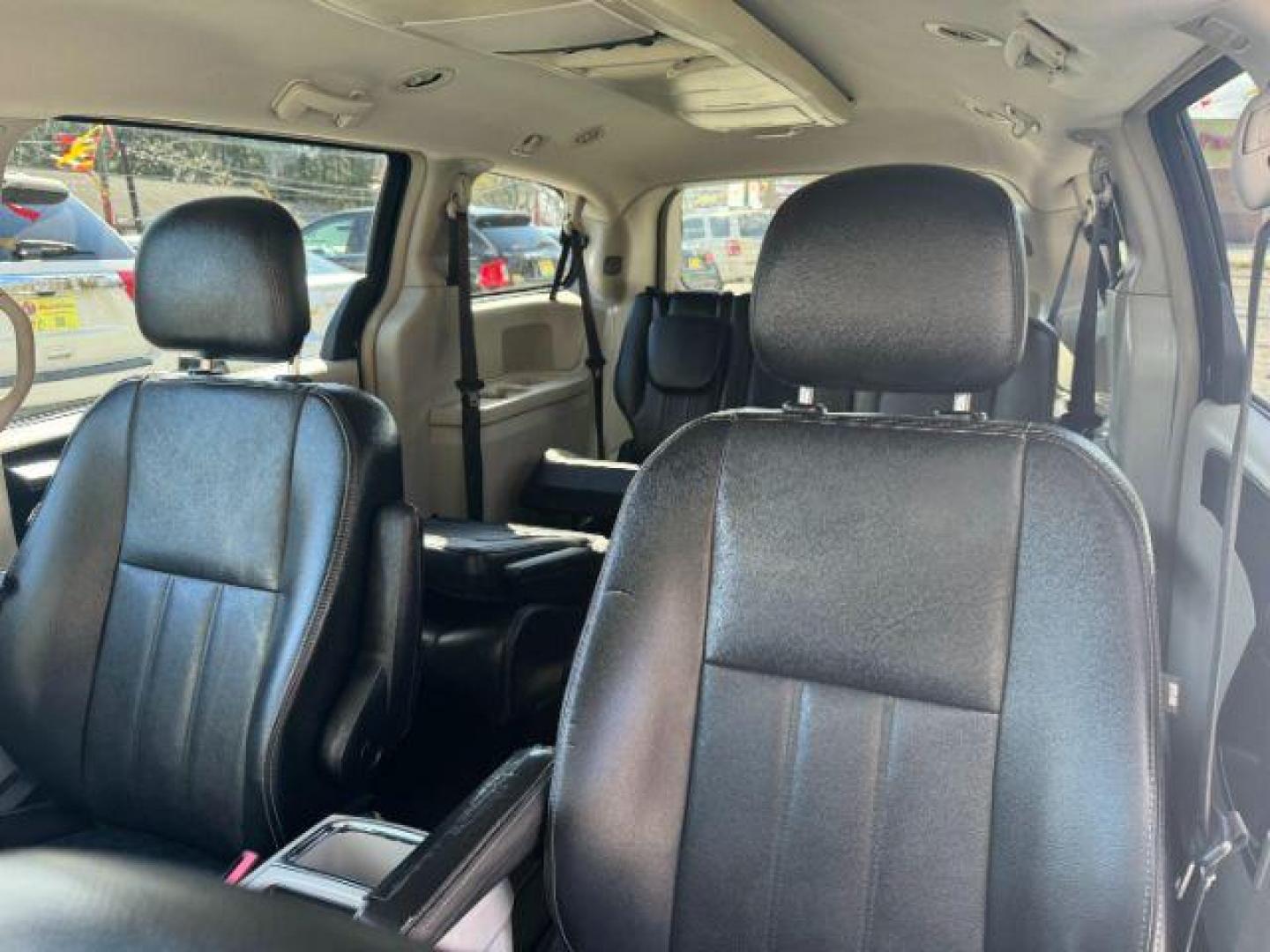 2012 Black Chrysler Town and Country Touring (2C4RC1BG3CR) with an 3.6L V6 DOHC 24V engine, 6-Speed Automatic transmission, located at 1806 Veterans Memorial Hwy SW, Austell, GA, 30168, (770) 944-9558, 33.817959, -84.606987 - Photo#6