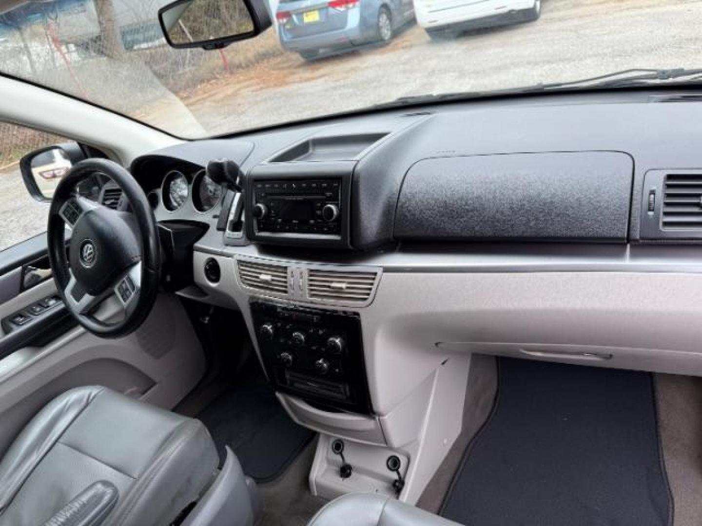2012 GRAY Volkswagen Routan SE (2C4RVABG8CR) with an 3.6L V6 DOHC 24V engine, 6-Speed Automatic transmission, located at 1806 Veterans Memorial Hwy SW, Austell, GA, 30168, (770) 944-9558, 33.817959, -84.606987 - Photo#21