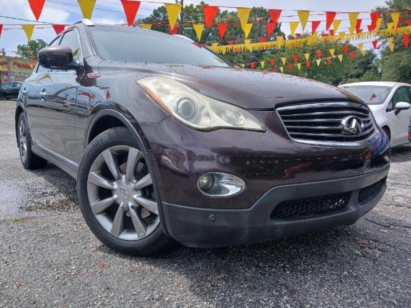 2010 Purple Infiniti EX EX35 Journey AWD (JN1AJ0HR2AM) with an 3.5L V6 DOHC 24V engine, 5-Speed Automatic Overdrive transmission, located at 1806 Veterans Memorial Hwy SW, Austell, GA, 30168, (770) 944-9558, 33.817959, -84.606987 - Photo#2