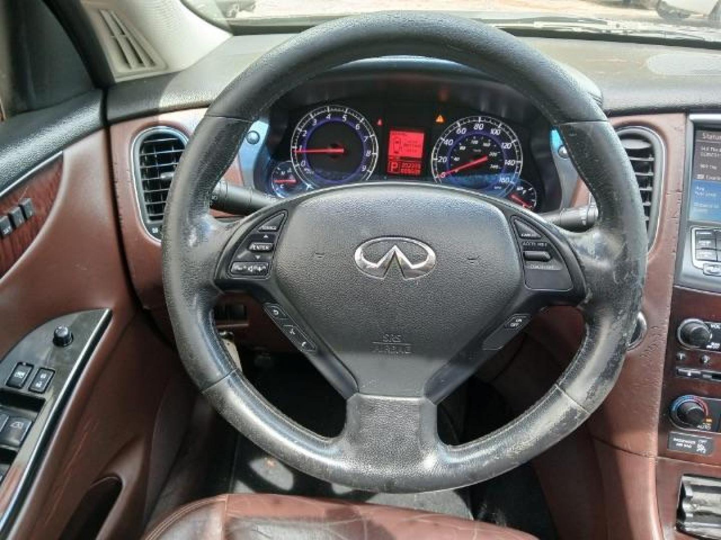 2010 Purple Infiniti EX EX35 Journey AWD (JN1AJ0HR2AM) with an 3.5L V6 DOHC 24V engine, 5-Speed Automatic Overdrive transmission, located at 1806 Veterans Memorial Hwy SW, Austell, GA, 30168, (770) 944-9558, 33.817959, -84.606987 - Photo#16