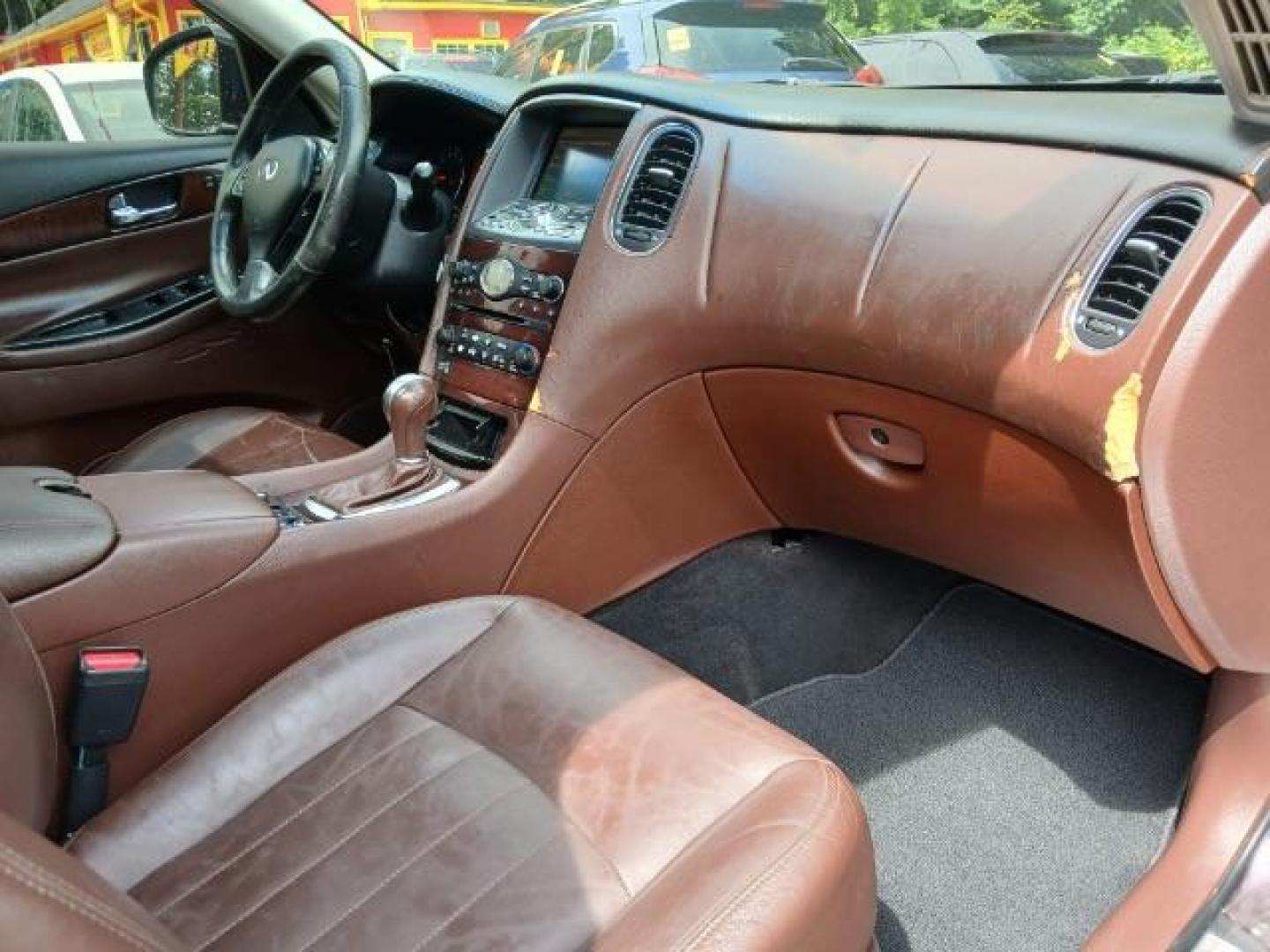 2010 Purple Infiniti EX EX35 Journey AWD (JN1AJ0HR2AM) with an 3.5L V6 DOHC 24V engine, 5-Speed Automatic Overdrive transmission, located at 1806 Veterans Memorial Hwy SW, Austell, GA, 30168, (770) 944-9558, 33.817959, -84.606987 - Photo#17