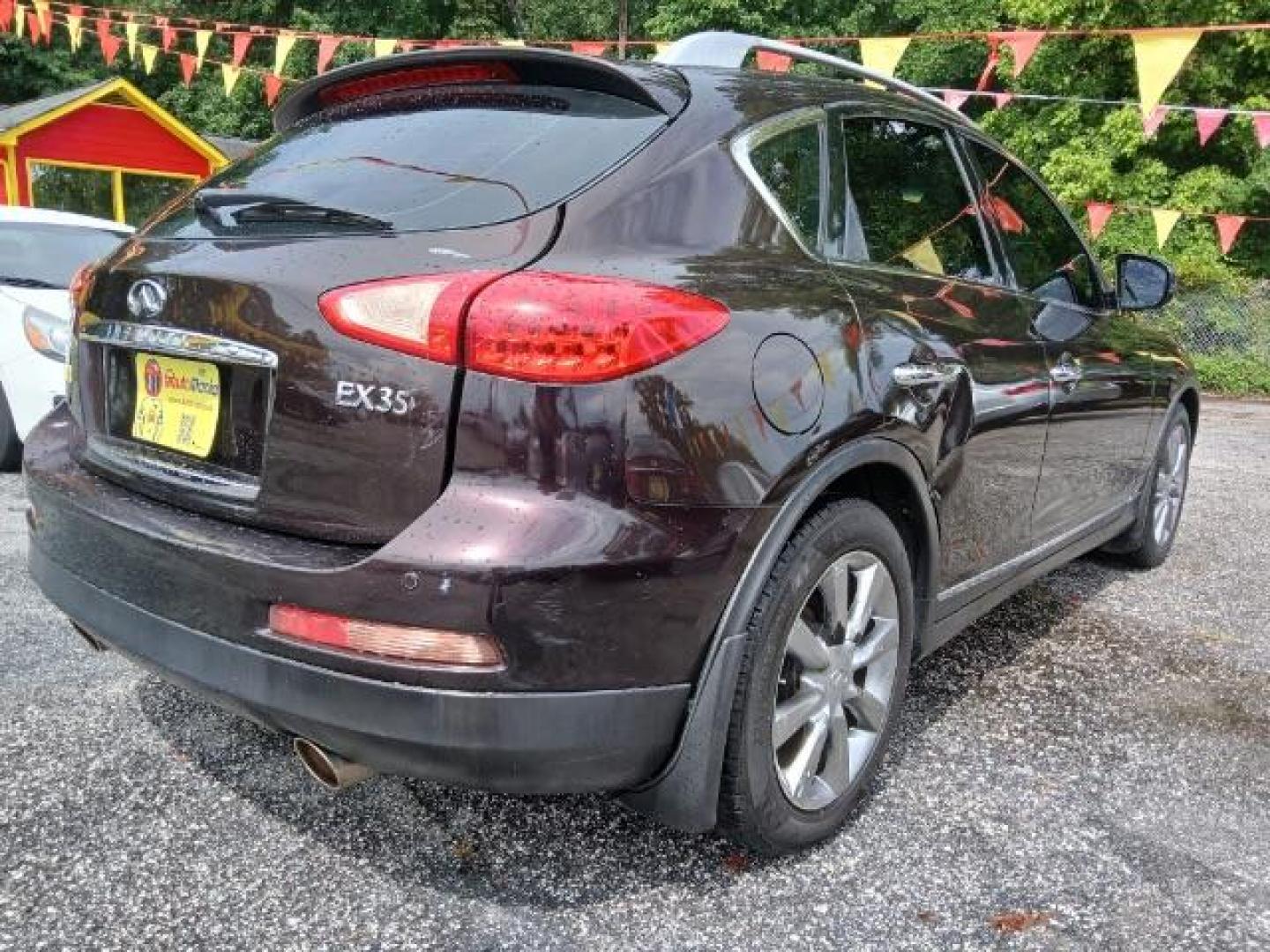 2010 Purple Infiniti EX EX35 Journey AWD (JN1AJ0HR2AM) with an 3.5L V6 DOHC 24V engine, 5-Speed Automatic Overdrive transmission, located at 1806 Veterans Memorial Hwy SW, Austell, GA, 30168, (770) 944-9558, 33.817959, -84.606987 - Photo#3