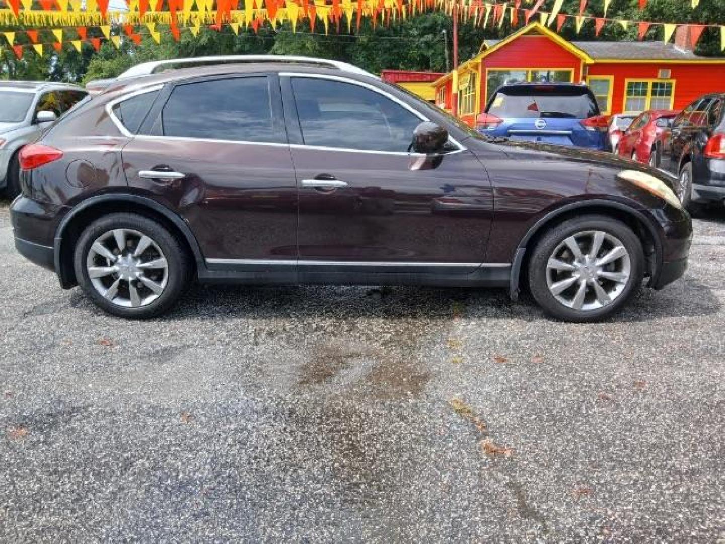 2010 Purple Infiniti EX EX35 Journey AWD (JN1AJ0HR2AM) with an 3.5L V6 DOHC 24V engine, 5-Speed Automatic Overdrive transmission, located at 1806 Veterans Memorial Hwy SW, Austell, GA, 30168, (770) 944-9558, 33.817959, -84.606987 - Photo#6