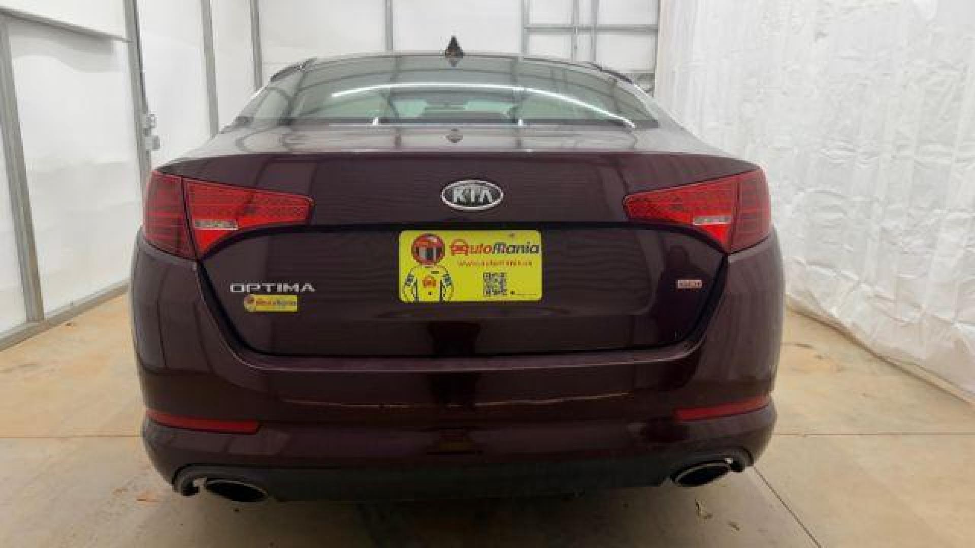 2012 Maroon Kia Optima LX AT (5XXGM4A74CG) with an 2.4L L4 DOHC 16V engine, 6-Speed Automatic transmission, located at 1806 Veterans Memorial Hwy SW, Austell, GA, 30168, (770) 944-9558, 33.817959, -84.606987 - Photo#4