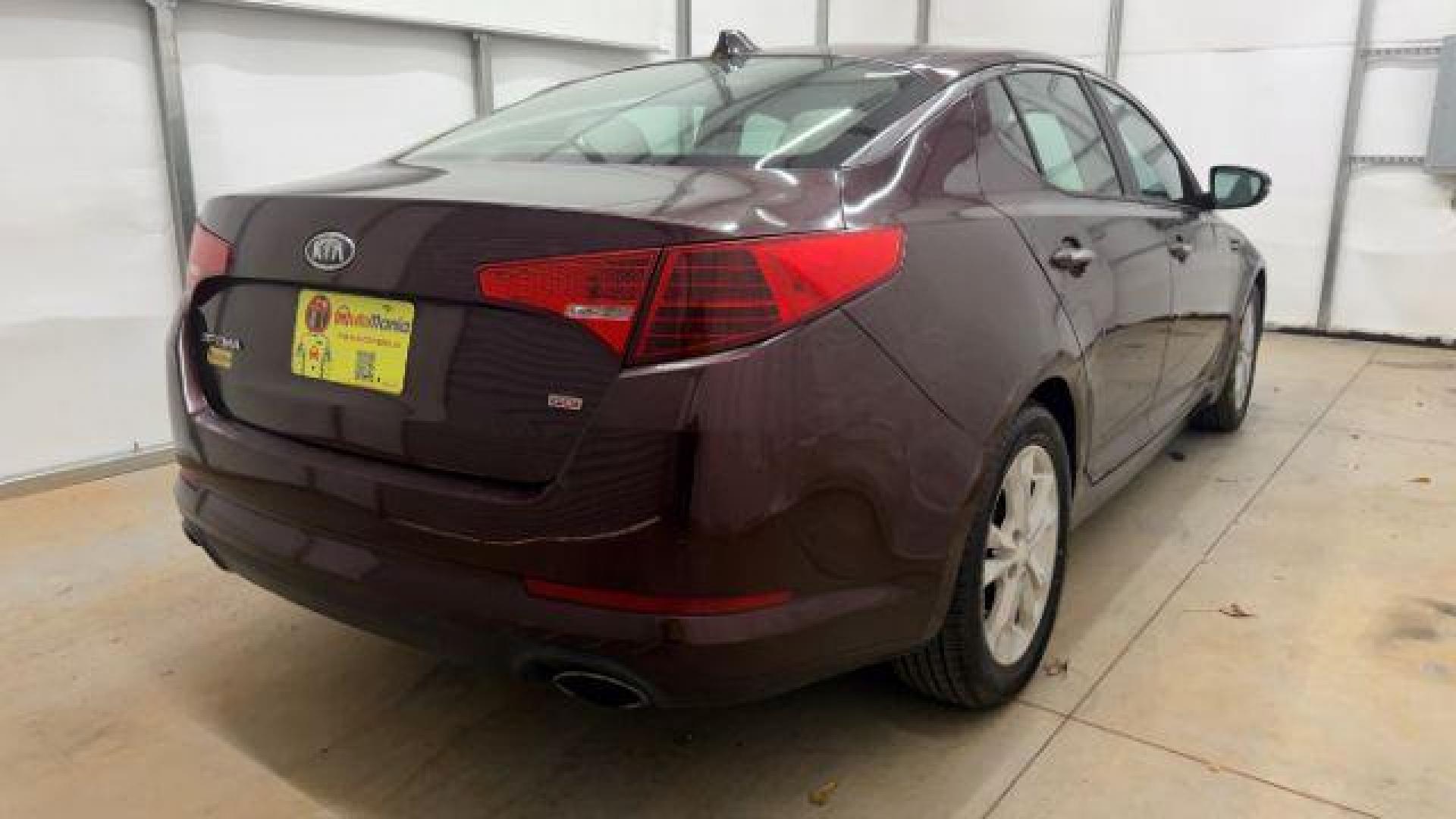 2012 Maroon Kia Optima LX AT (5XXGM4A74CG) with an 2.4L L4 DOHC 16V engine, 6-Speed Automatic transmission, located at 1806 Veterans Memorial Hwy SW, Austell, GA, 30168, (770) 944-9558, 33.817959, -84.606987 - Photo#5