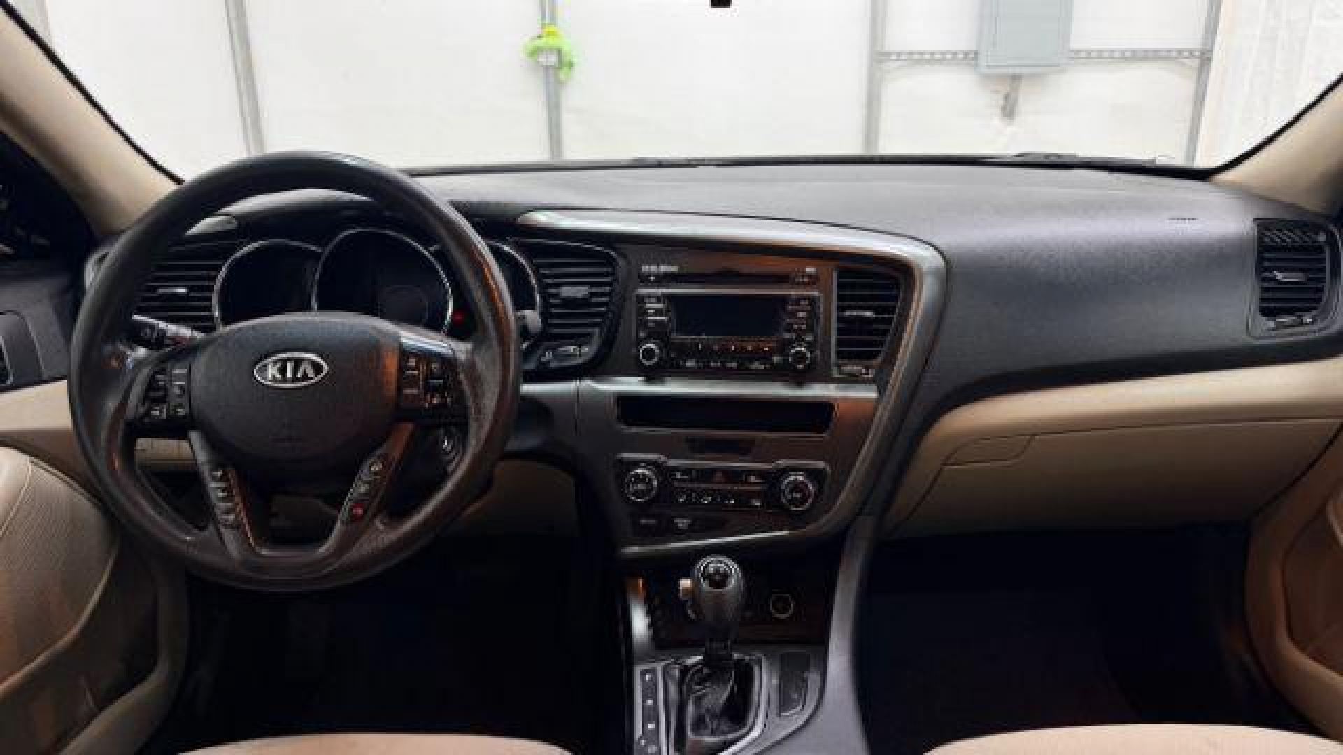 2012 Maroon Kia Optima LX AT (5XXGM4A74CG) with an 2.4L L4 DOHC 16V engine, 6-Speed Automatic transmission, located at 1806 Veterans Memorial Hwy SW, Austell, GA, 30168, (770) 944-9558, 33.817959, -84.606987 - Photo#15