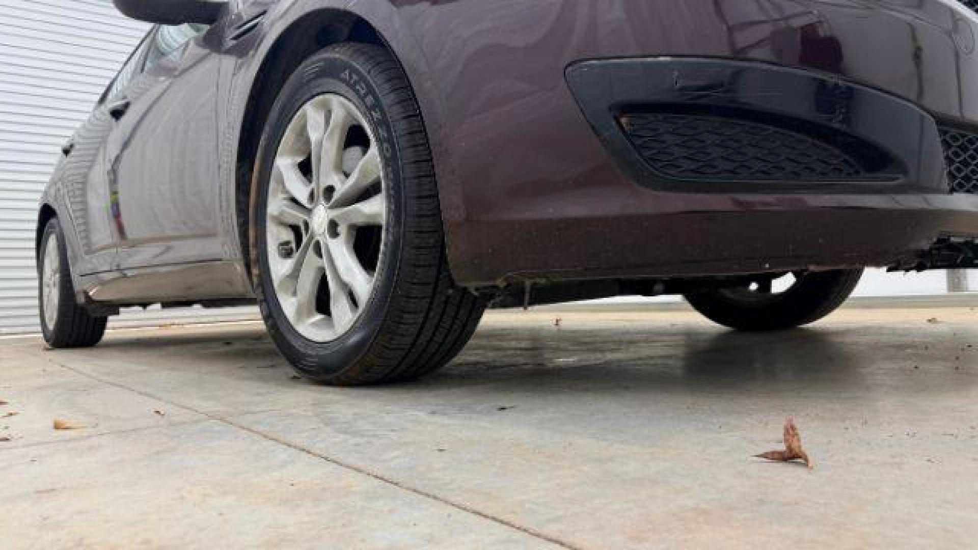 2012 Maroon Kia Optima LX AT (5XXGM4A74CG) with an 2.4L L4 DOHC 16V engine, 6-Speed Automatic transmission, located at 1806 Veterans Memorial Hwy SW, Austell, GA, 30168, (770) 944-9558, 33.817959, -84.606987 - Photo#18