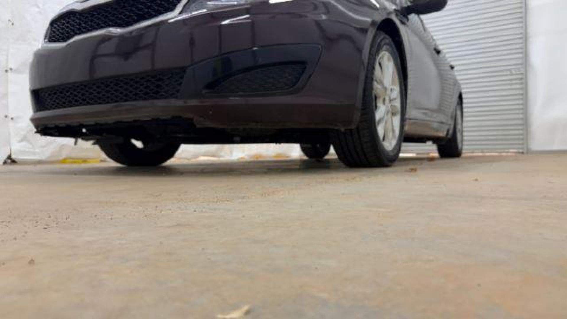 2012 Maroon Kia Optima LX AT (5XXGM4A74CG) with an 2.4L L4 DOHC 16V engine, 6-Speed Automatic transmission, located at 1806 Veterans Memorial Hwy SW, Austell, GA, 30168, (770) 944-9558, 33.817959, -84.606987 - Photo#21