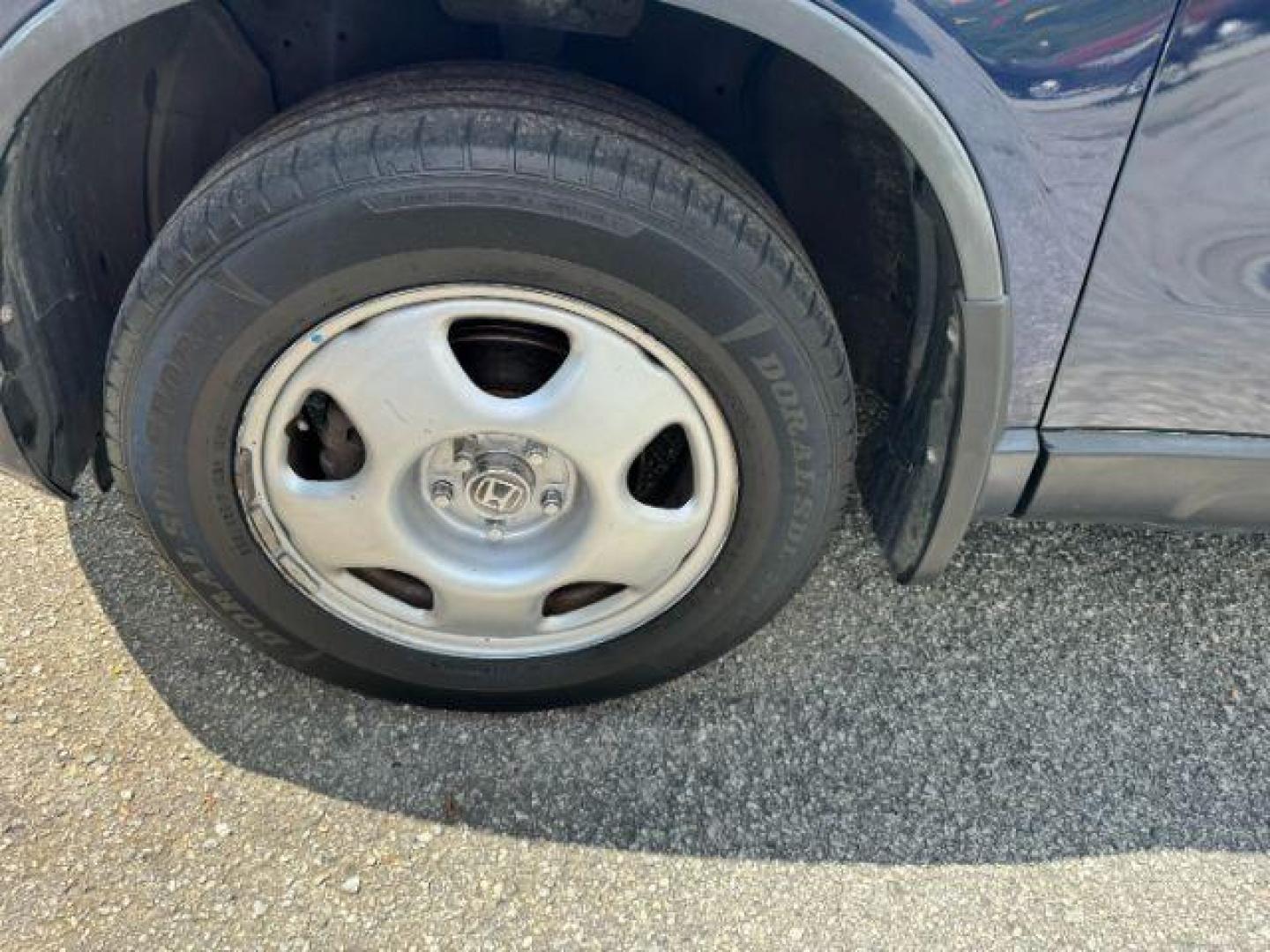 2009 Blue Honda CR-V LX 2WD 5-Speed AT (JHLRE38399C) with an 2.4L L4 DOHC 16V engine, 5-Speed Automatic transmission, located at 1806 Veterans Memorial Hwy SW, Austell, GA, 30168, (770) 944-9558, 33.817959, -84.606987 - Photo#19