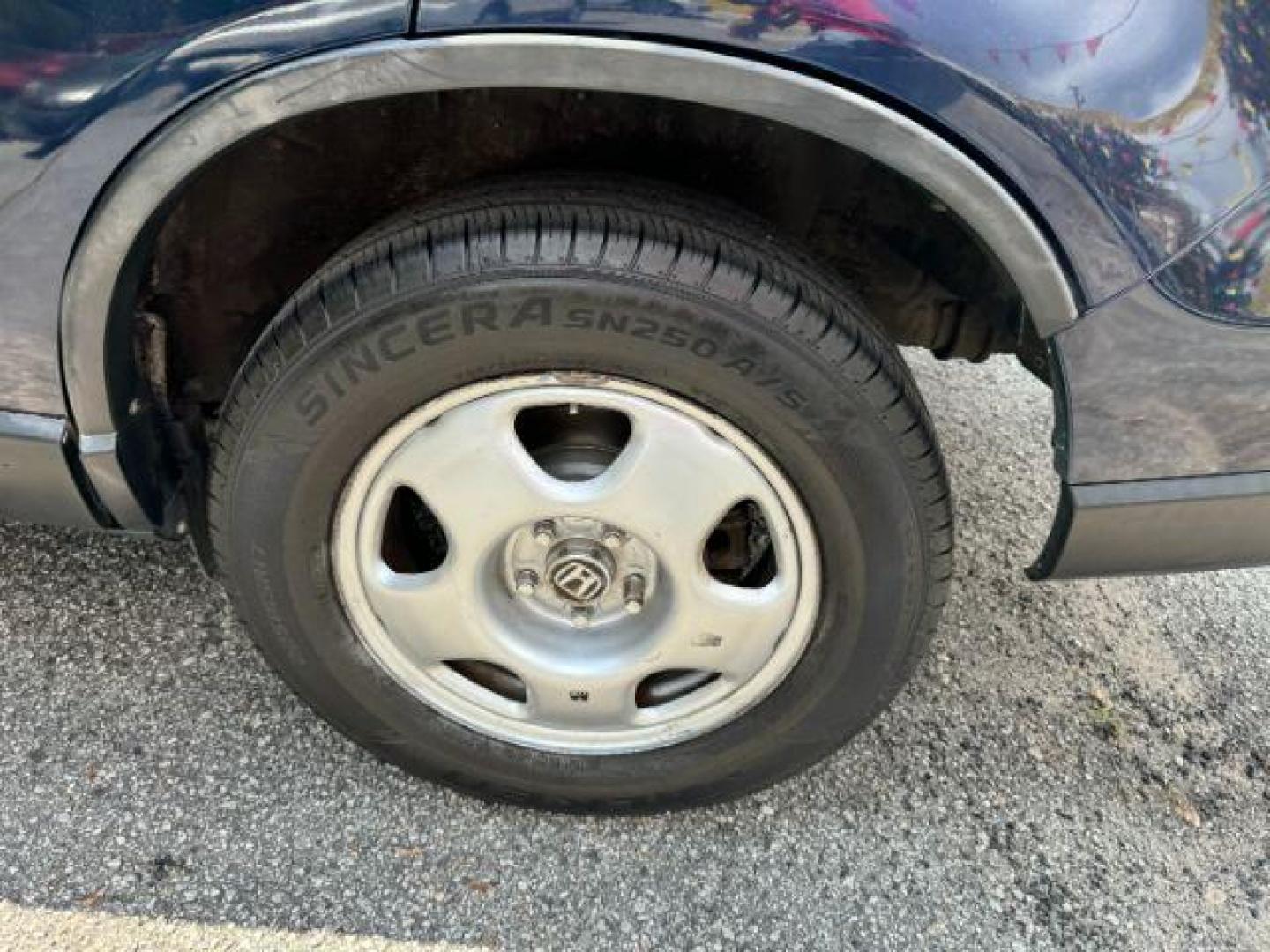 2009 Blue Honda CR-V LX 2WD 5-Speed AT (JHLRE38399C) with an 2.4L L4 DOHC 16V engine, 5-Speed Automatic transmission, located at 1806 Veterans Memorial Hwy SW, Austell, GA, 30168, (770) 944-9558, 33.817959, -84.606987 - Photo#22