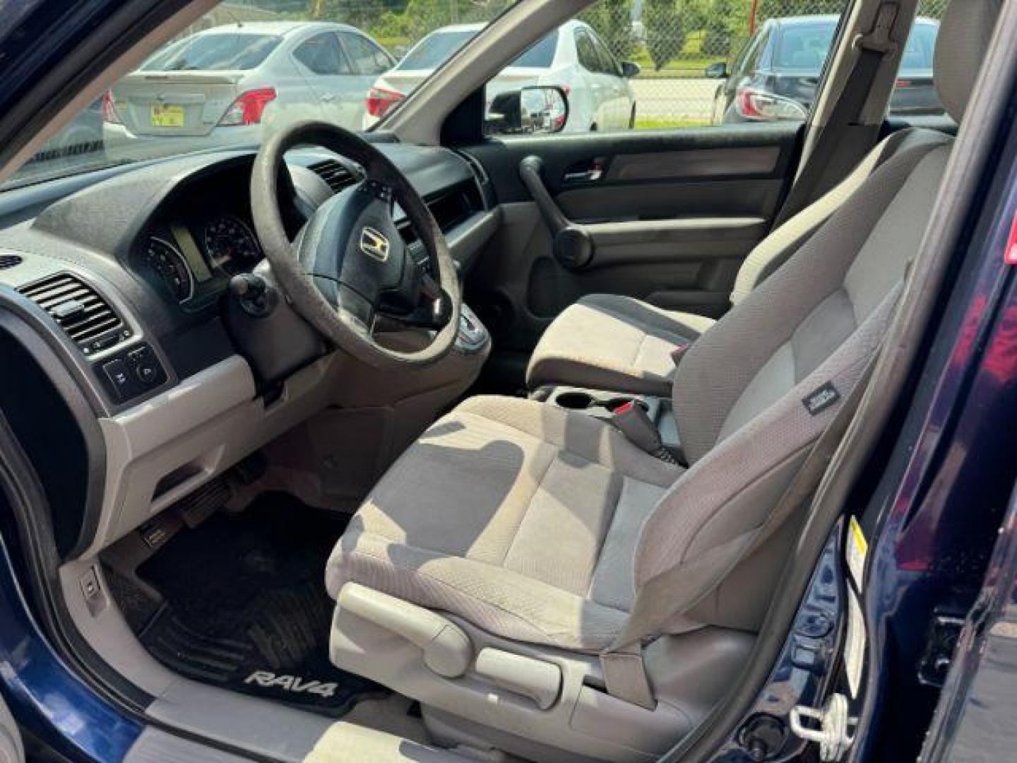 2009 Blue Honda CR-V LX 2WD 5-Speed AT (JHLRE38399C) with an 2.4L L4 DOHC 16V engine, 5-Speed Automatic transmission, located at 1806 Veterans Memorial Hwy SW, Austell, GA, 30168, (770) 944-9558, 33.817959, -84.606987 - Photo#4