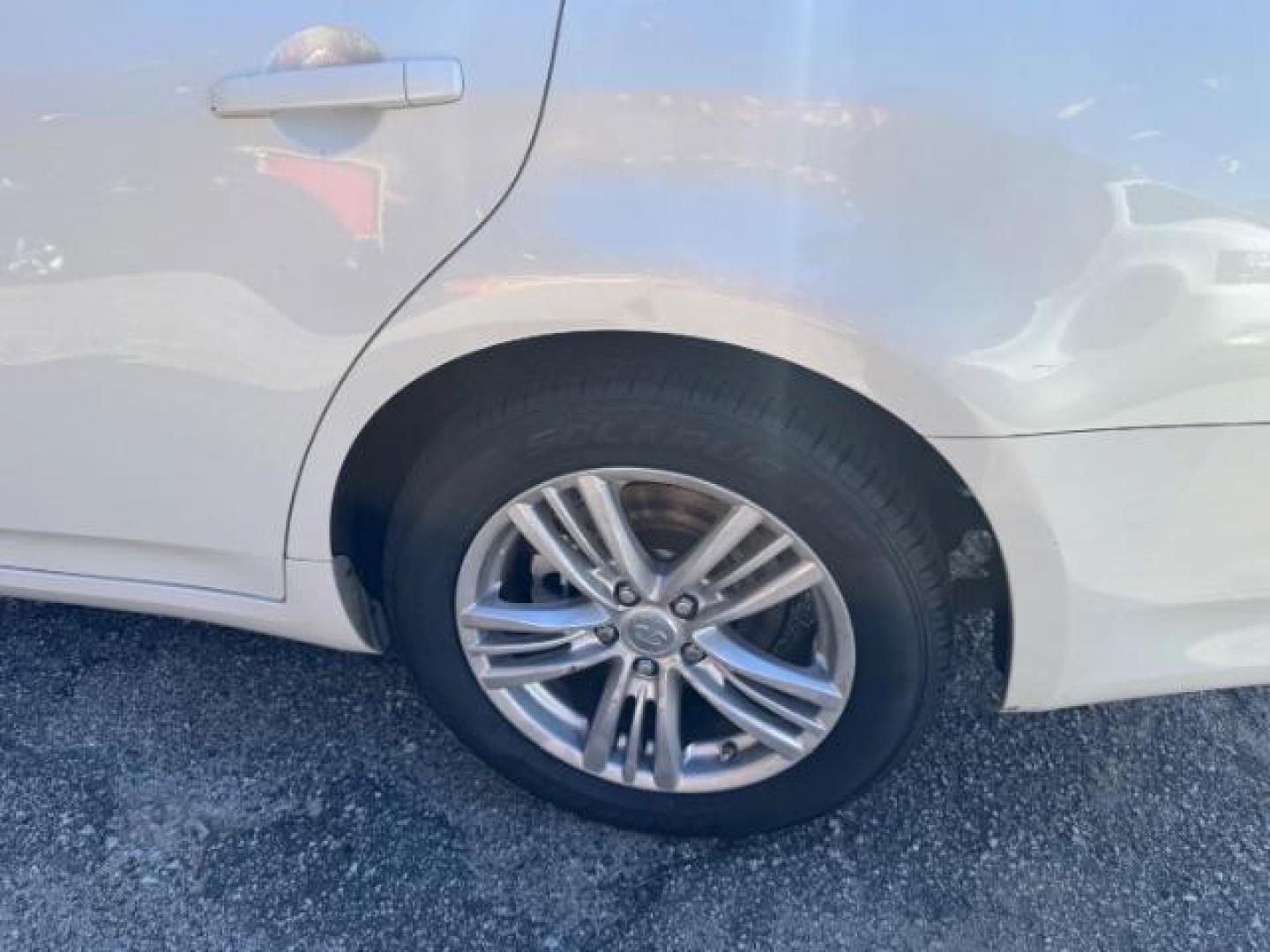 2011 WHITE Infiniti G Sedan G25x AWD (JN1DV6AR5BM) with an 2.5L L4 DOHC 16V engine, 5-Speed Automatic transmission, located at 1806 Veterans Memorial Hwy SW, Austell, GA, 30168, (770) 944-9558, 33.817959, -84.606987 - Photo#16