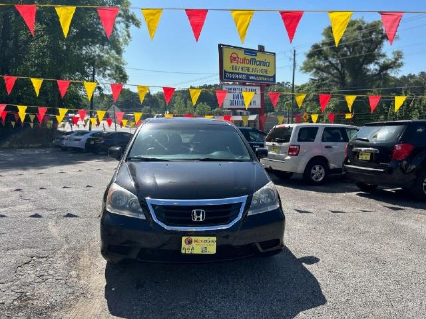 2010 Black Honda Odyssey EX-L w/ DVD (5FNRL3H79AB) with an 3.5L V6 SOHC 24V engine, 5-Speed Automatic transmission, located at 1806 Veterans Memorial Hwy SW, Austell, GA, 30168, (770) 944-9558, 33.817959, -84.606987 - Photo#0