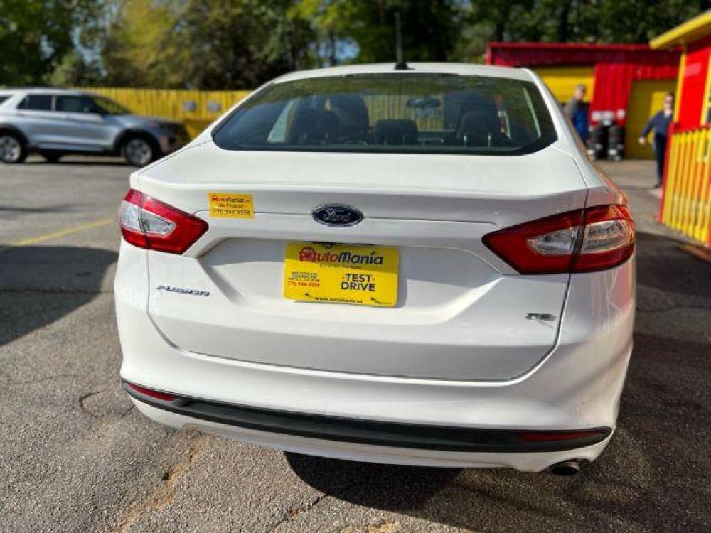 2016 White Ford Fusion SE (3FA6P0H72GR) with an 2.5L L4 DOHC 16V engine, 6-Speed Automatic transmission, located at 1806 Veterans Memorial Hwy SW, Austell, GA, 30168, (770) 944-9558, 33.817959, -84.606987 - Photo #4