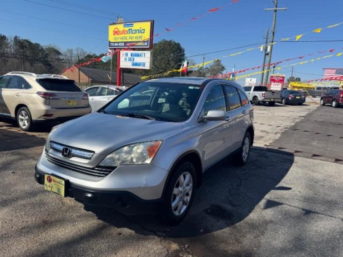 2009 Silver Honda CR-V EX-L 2WD 5-Speed AT (5J6RE38749L) with an 2.4L L4 DOHC 16V engine, 5-Speed Automatic transmission, located at 1806 Veterans Memorial Hwy SW, Austell, GA, 30168, (770) 944-9558, 33.817959, -84.606987 - Photo#0