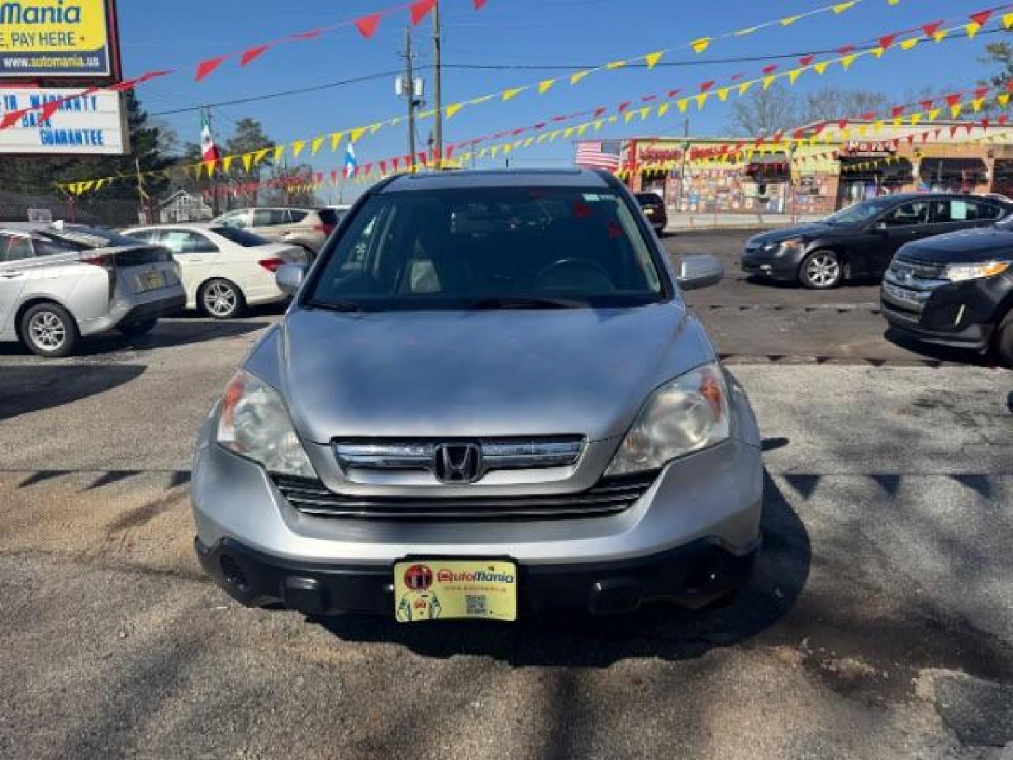 2009 Silver Honda CR-V EX-L 2WD 5-Speed AT (5J6RE38749L) with an 2.4L L4 DOHC 16V engine, 5-Speed Automatic transmission, located at 1806 Veterans Memorial Hwy SW, Austell, GA, 30168, (770) 944-9558, 33.817959, -84.606987 - Photo#1